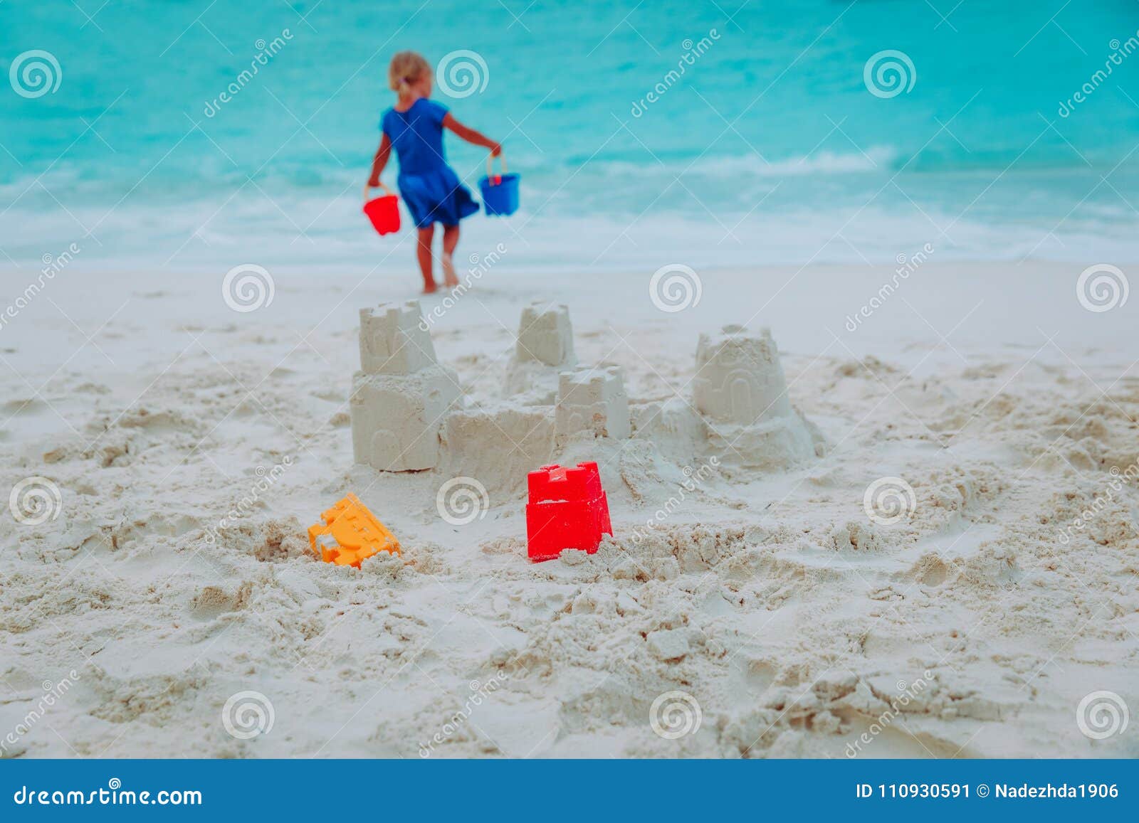 Little Girl Building Sand Castle on Beach Stock Image - Image of ...