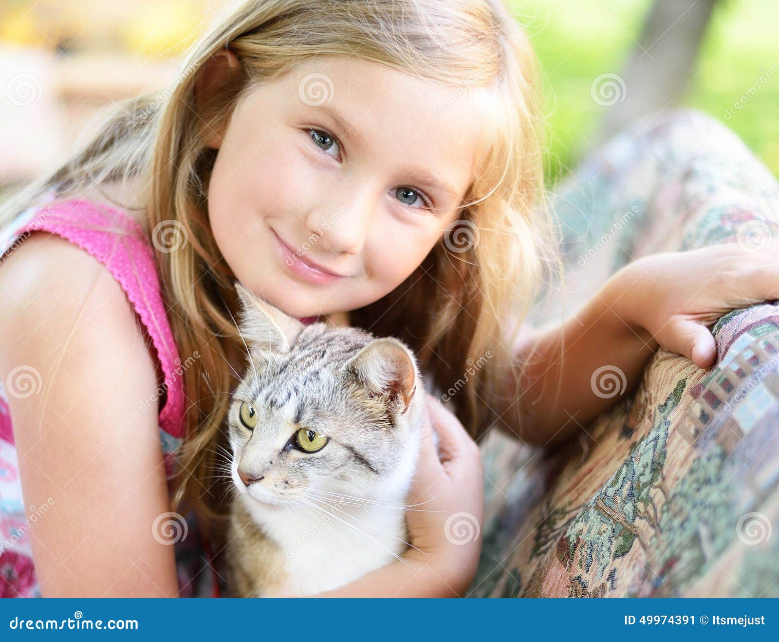 Little girl with cat. stock image. Image of kitten, concept 49974391