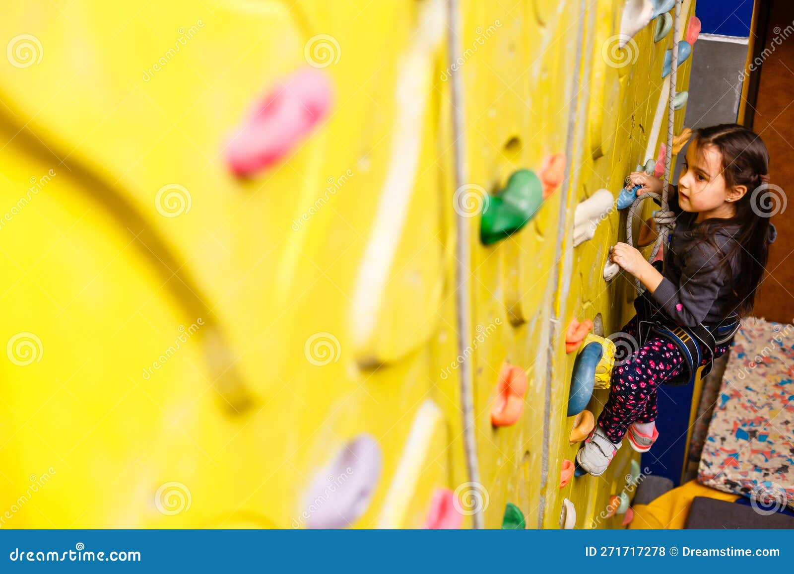 Little Girl Climbing Rock Wall Stock Photo Image of climb, fitness