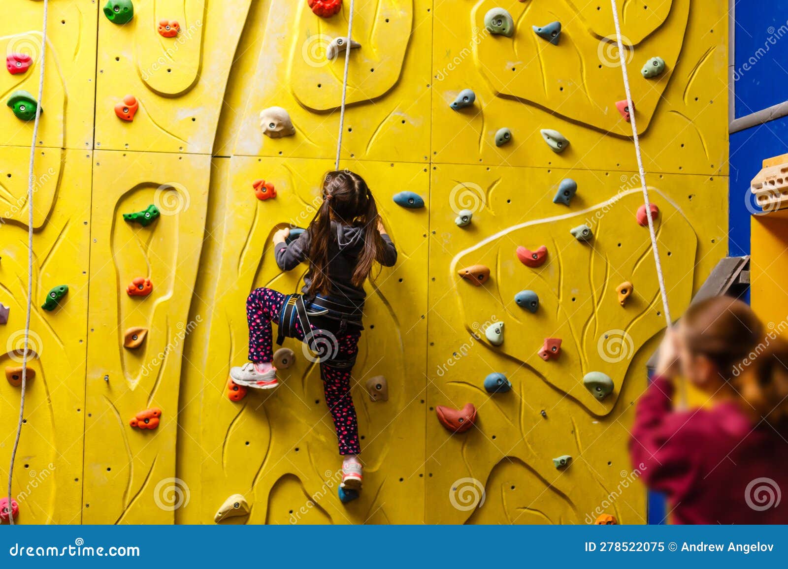 Little Girl Climbing Rock Wall Stock Image Image of safety, rock