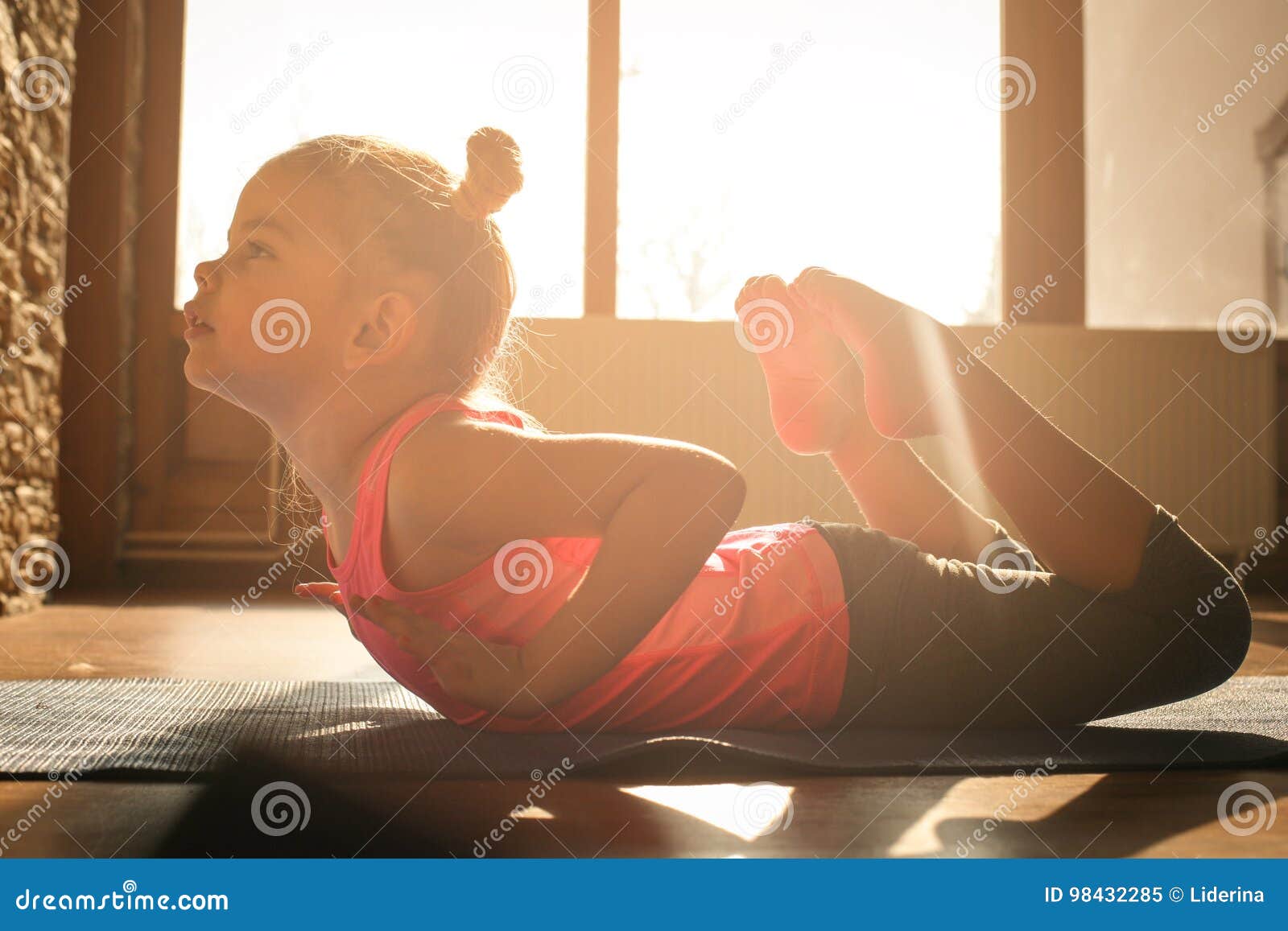 Little Girl Doing Exercise at Home. Stock Image Image of floor