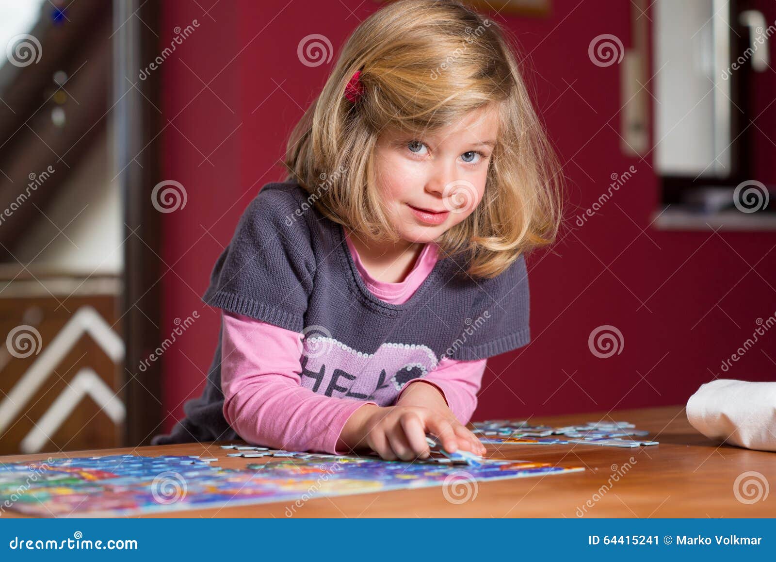 Little Girl Doing a Jigsaw Puzzle Stock Image Image of family, play