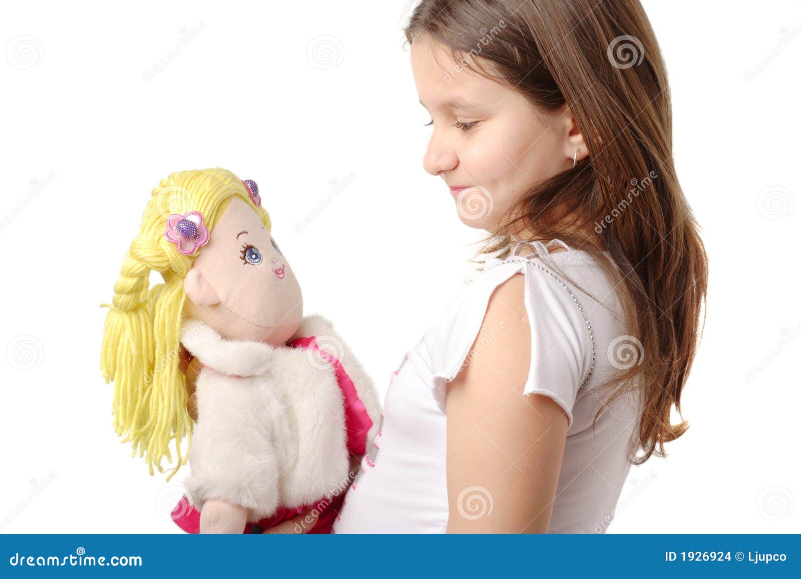 Little girl with a doll stock photo. Image of hold, gentle 1926924