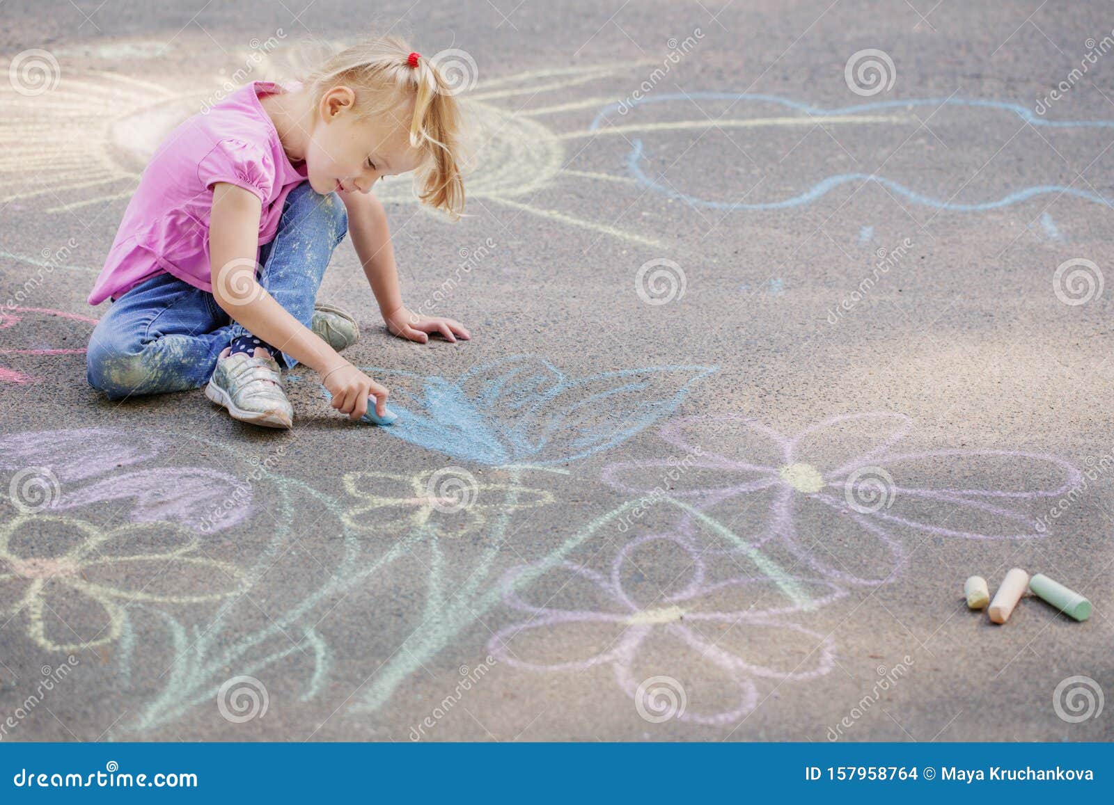 Little Girl Draws With Chalk Stock Photo - Image of child 