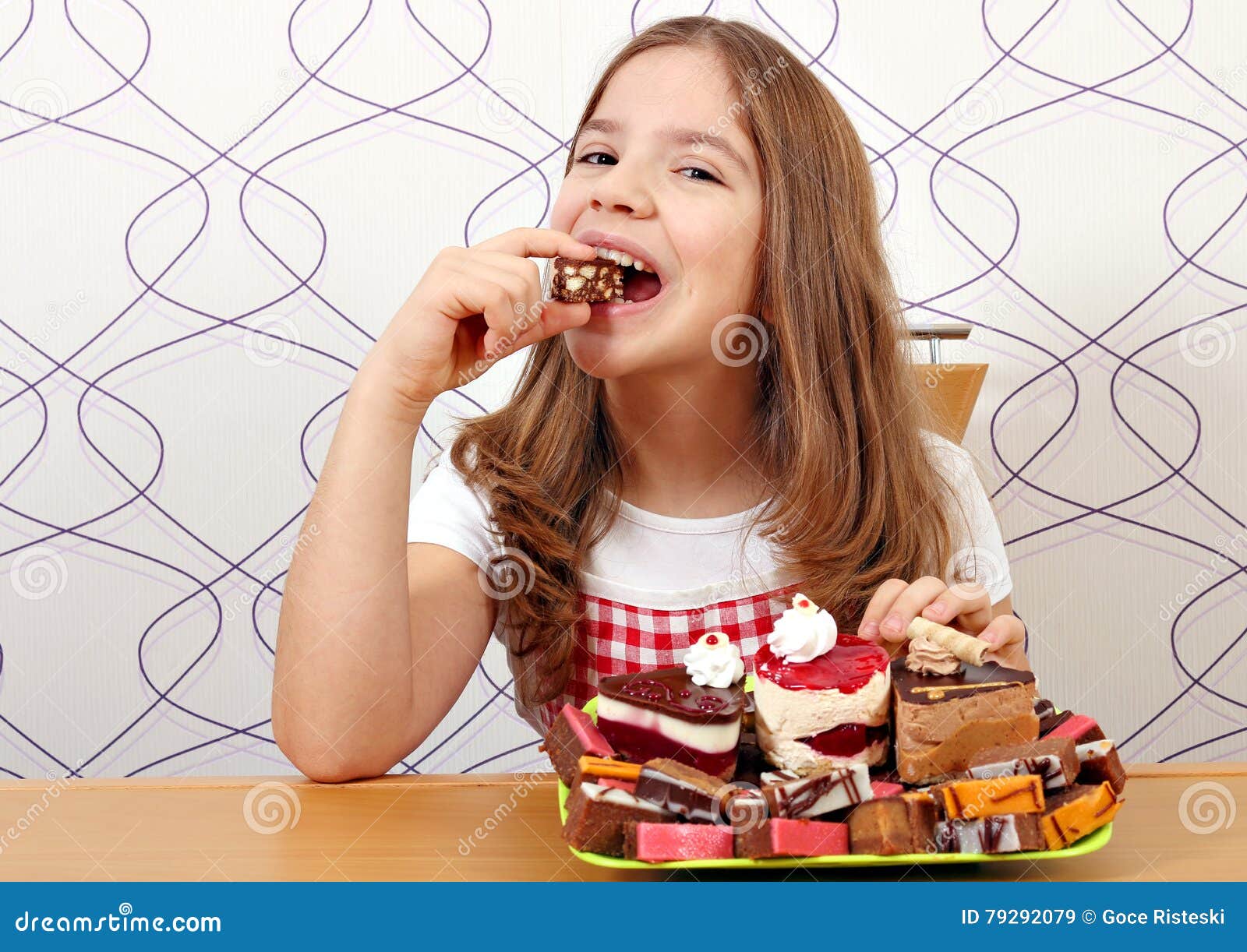Little girl eat cake stock image. Image of people, lifestyle 79292079