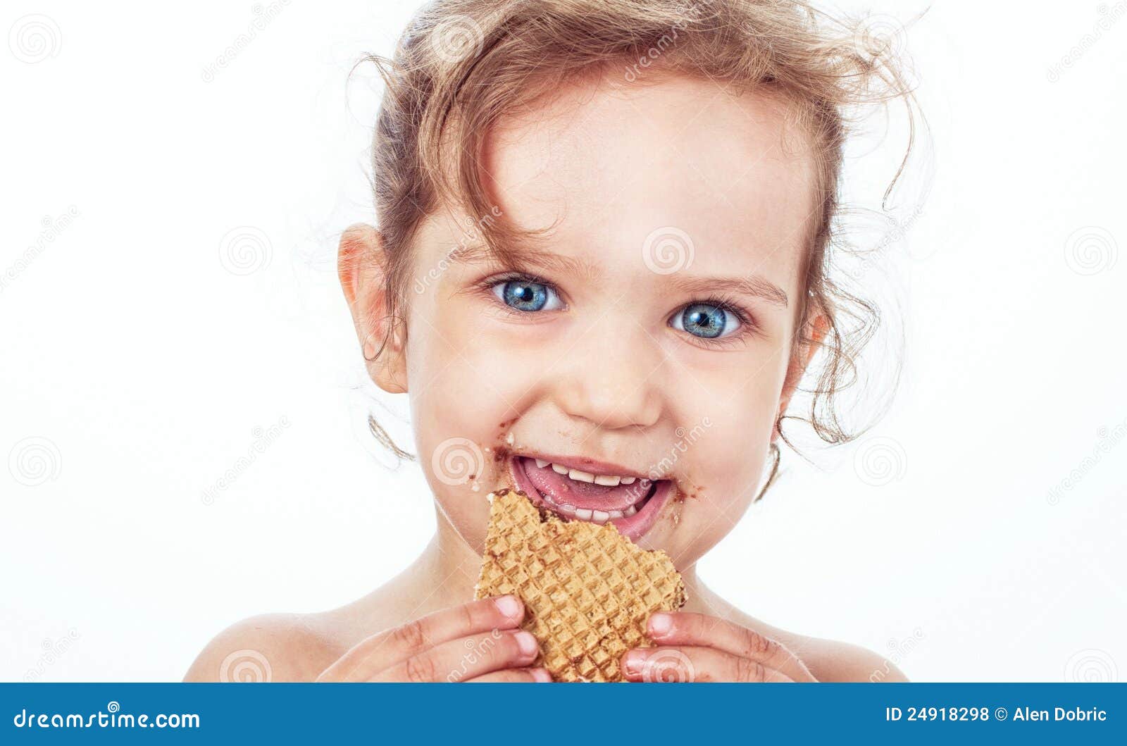 Little Girl Eating a Cookie Stock Photo Image of blond, beautiful