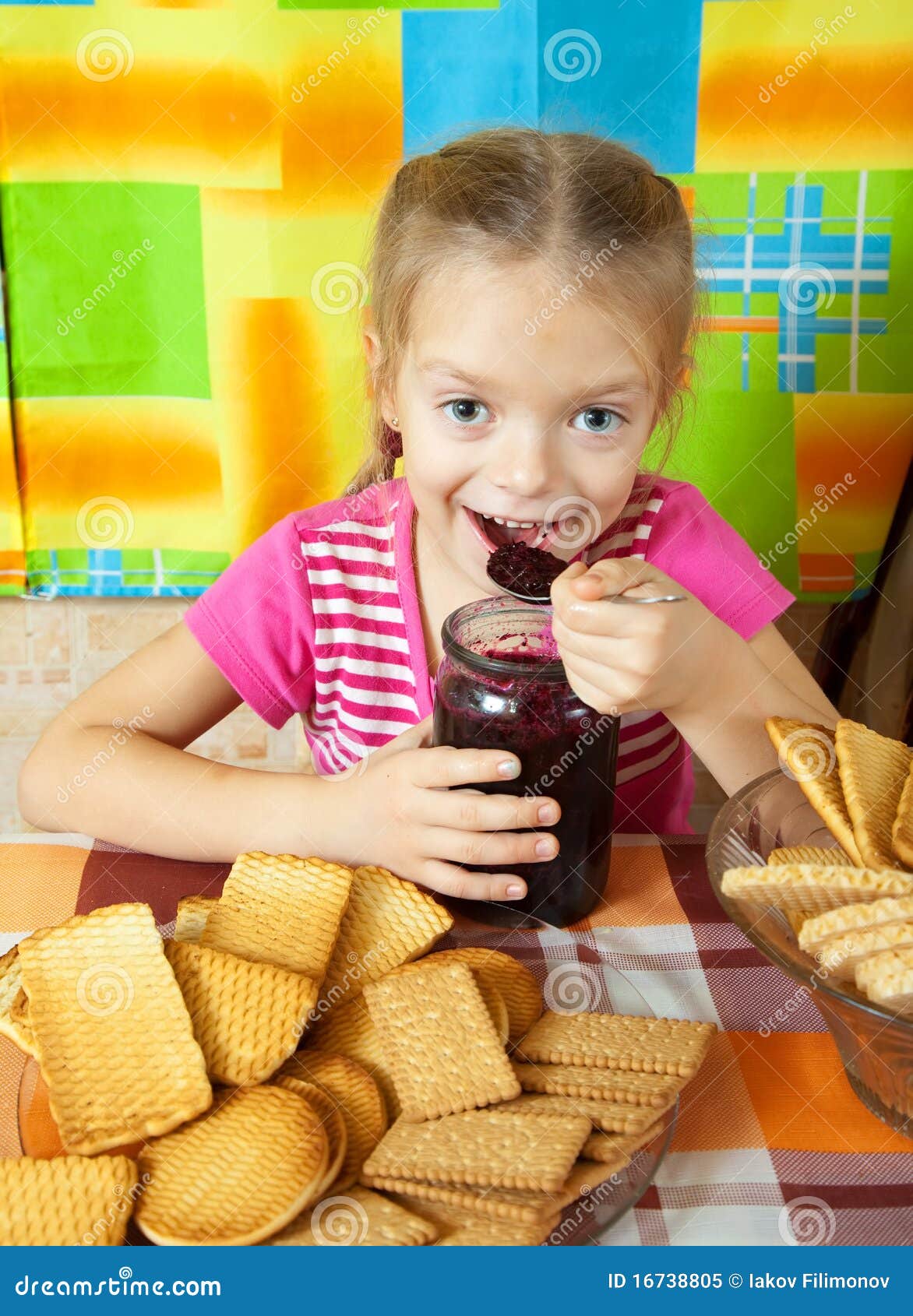 Little girl eating jam stock image. Image of girl, plum 16738805