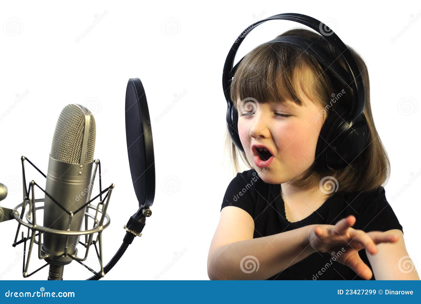 little girl engrossed in singing