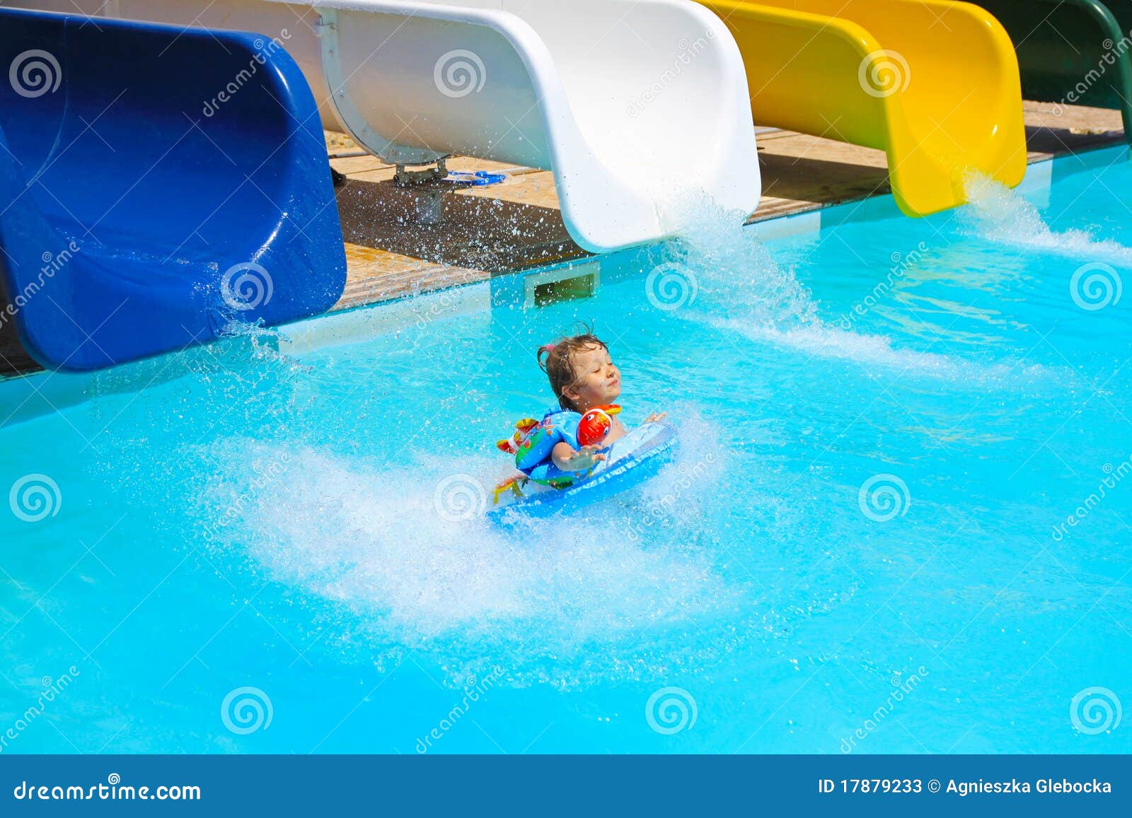 Little Girl Falls into the Pool with Water Slides Stock Image Image