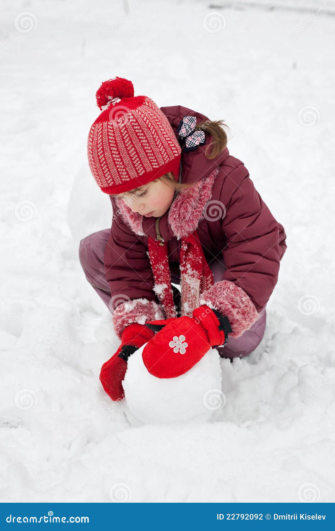 The Little Girl Fashions Snowman Stock Photo - Image of cold, hair ...