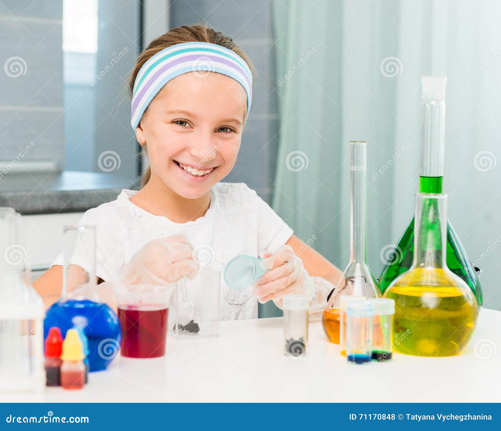 Little Girl with Flasks for Chemistry Stock Photo Image of school