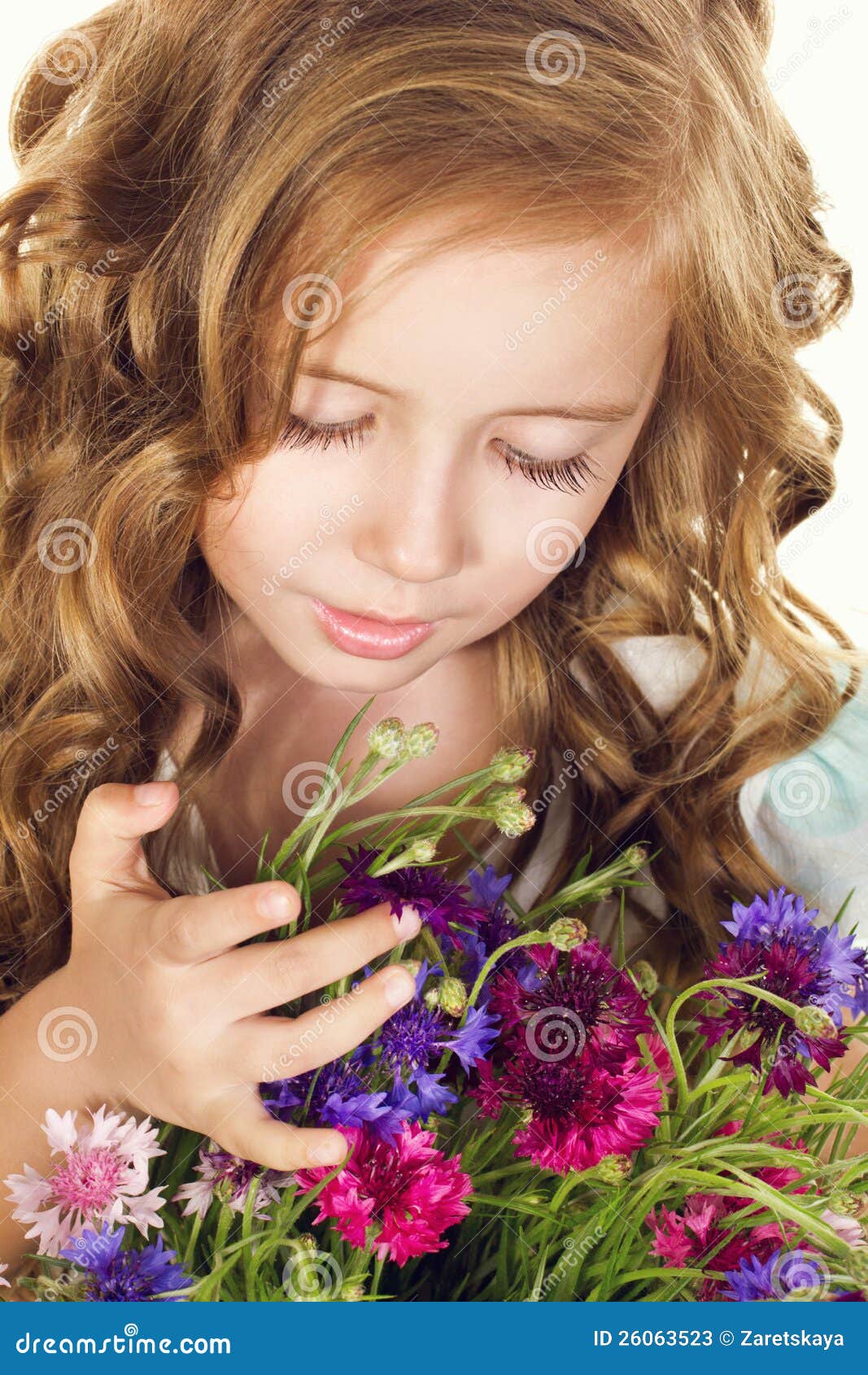 Little girl with flowers stock image. Image of field 26063523