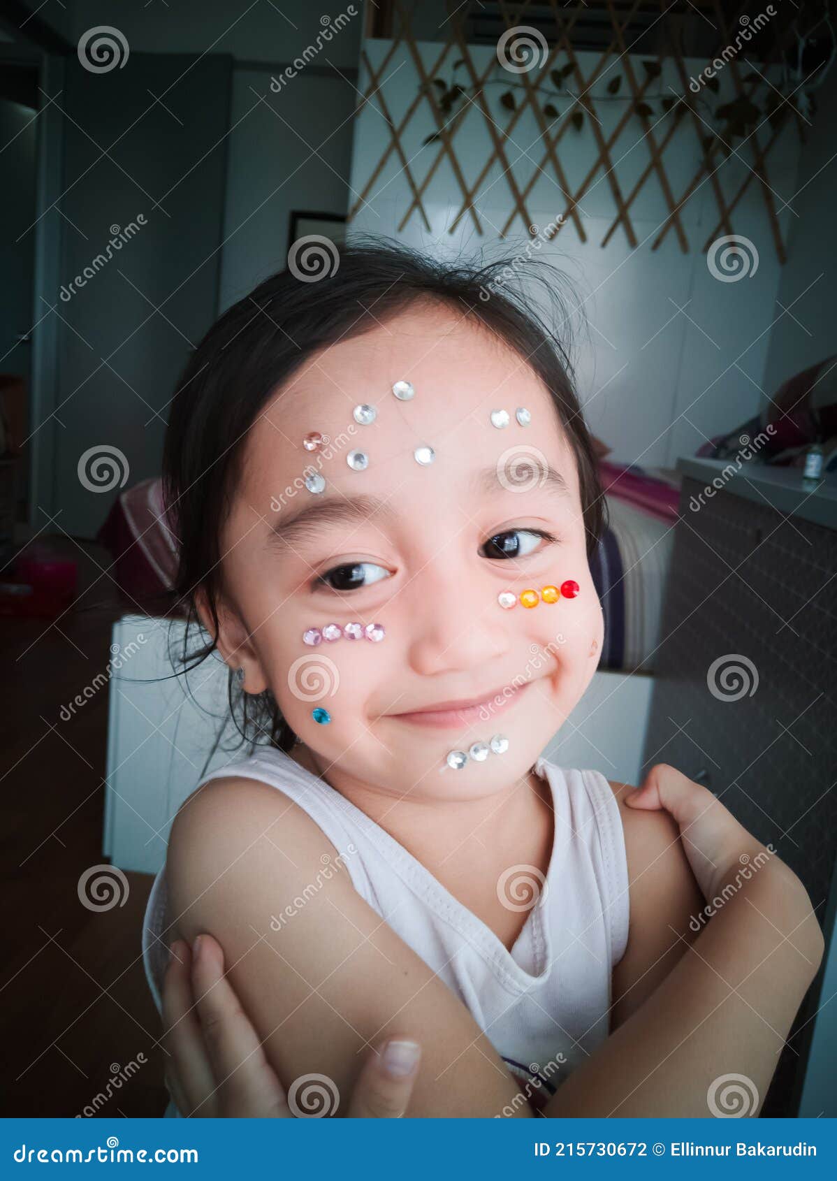 Little Girl with Glitter Stickers on Her Face Stock Photo Image of labels, childhood 215730672