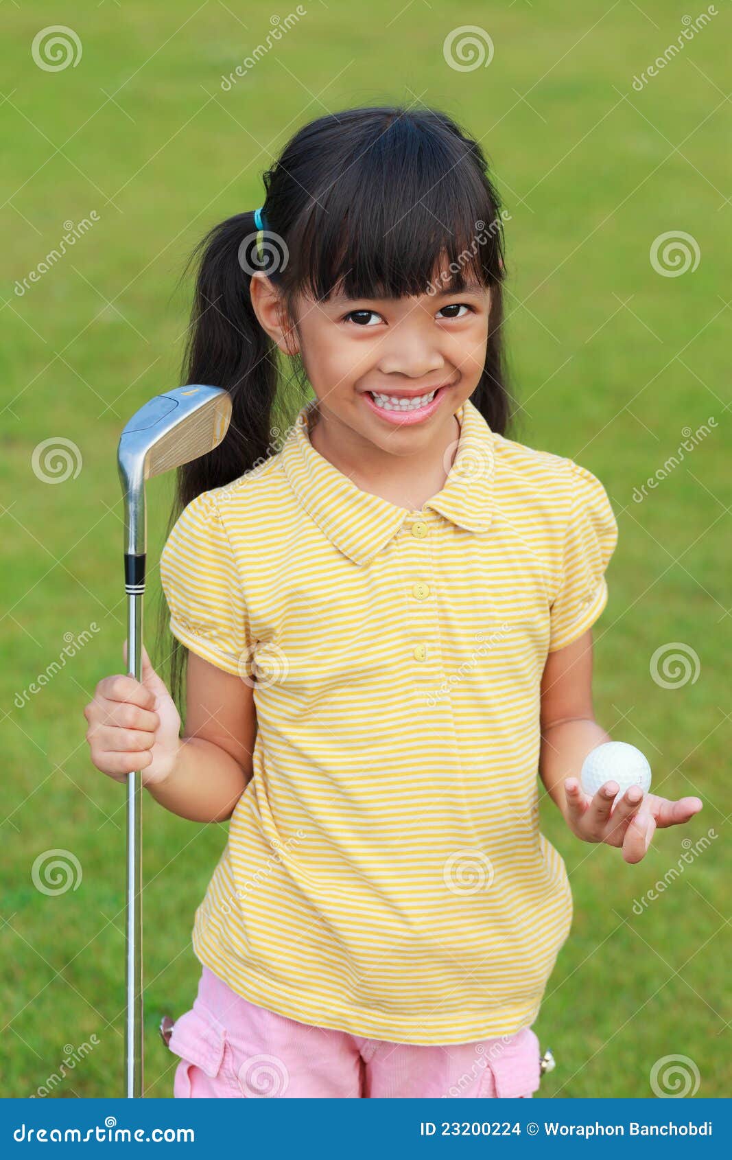 Little girl at golf club stock photo. Image of child 23200224
