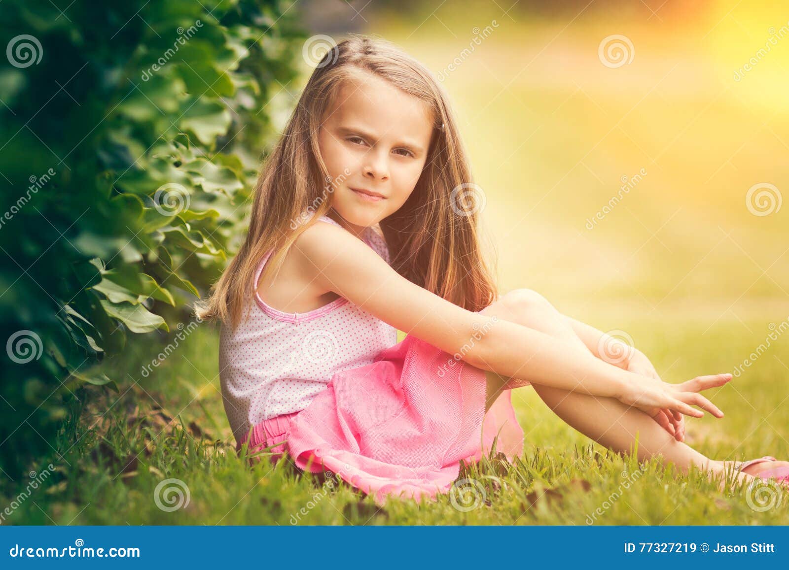 Little Girl in Grass stock image. Image of nature, child - 77327219