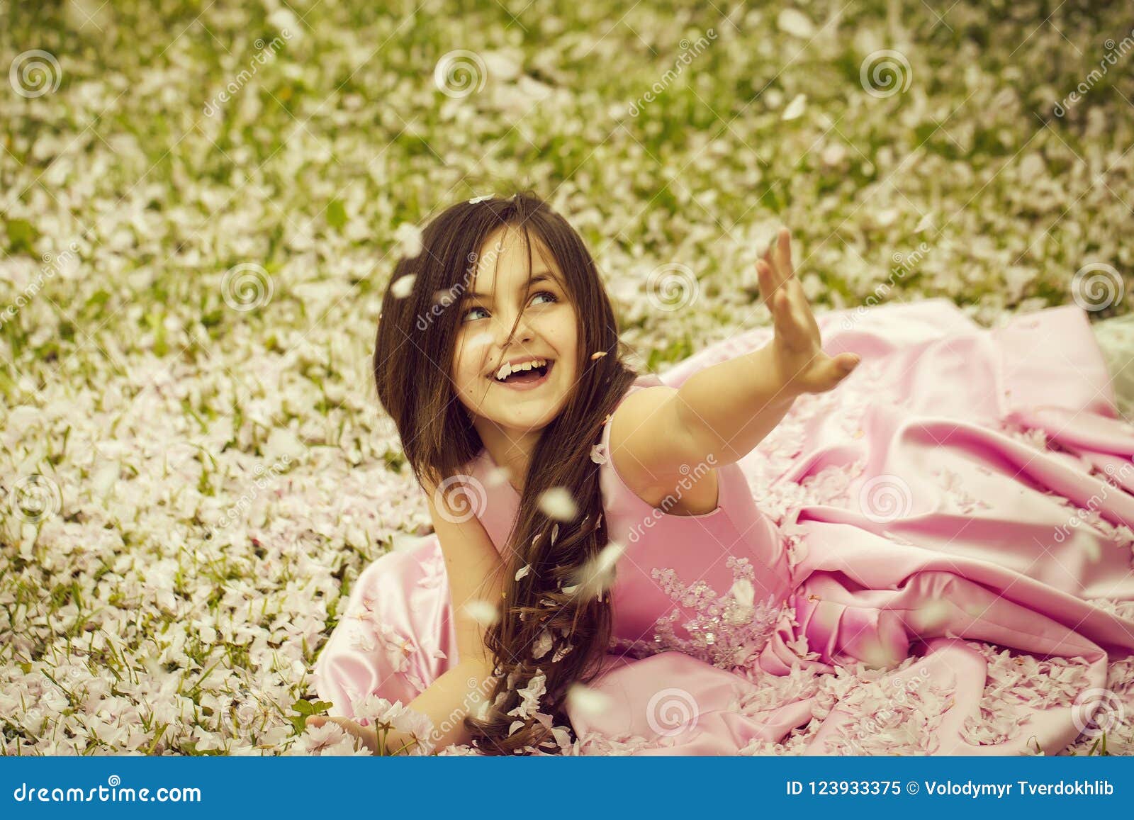 Little Girl on Green Grass with Petals Stock Image - Image of flower ...