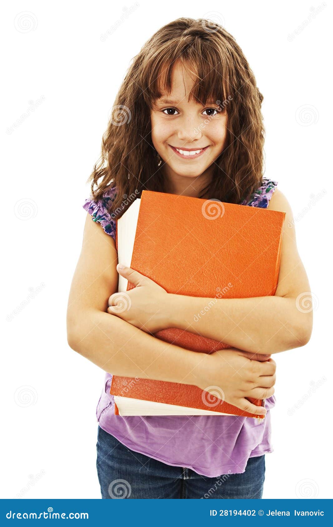 Little Girl Holding a Big Book. Stock Photo Image of child