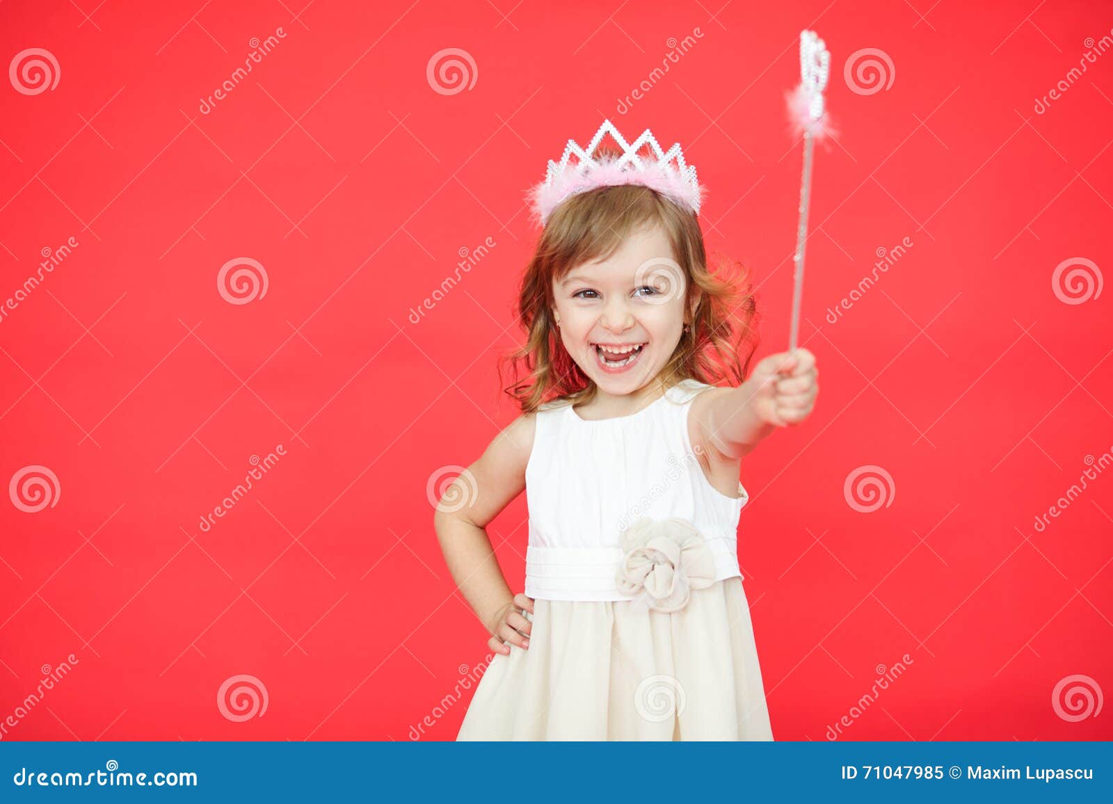 Little Girl Holding a Magic Wand in Her Hand Stock Image - Image of ...