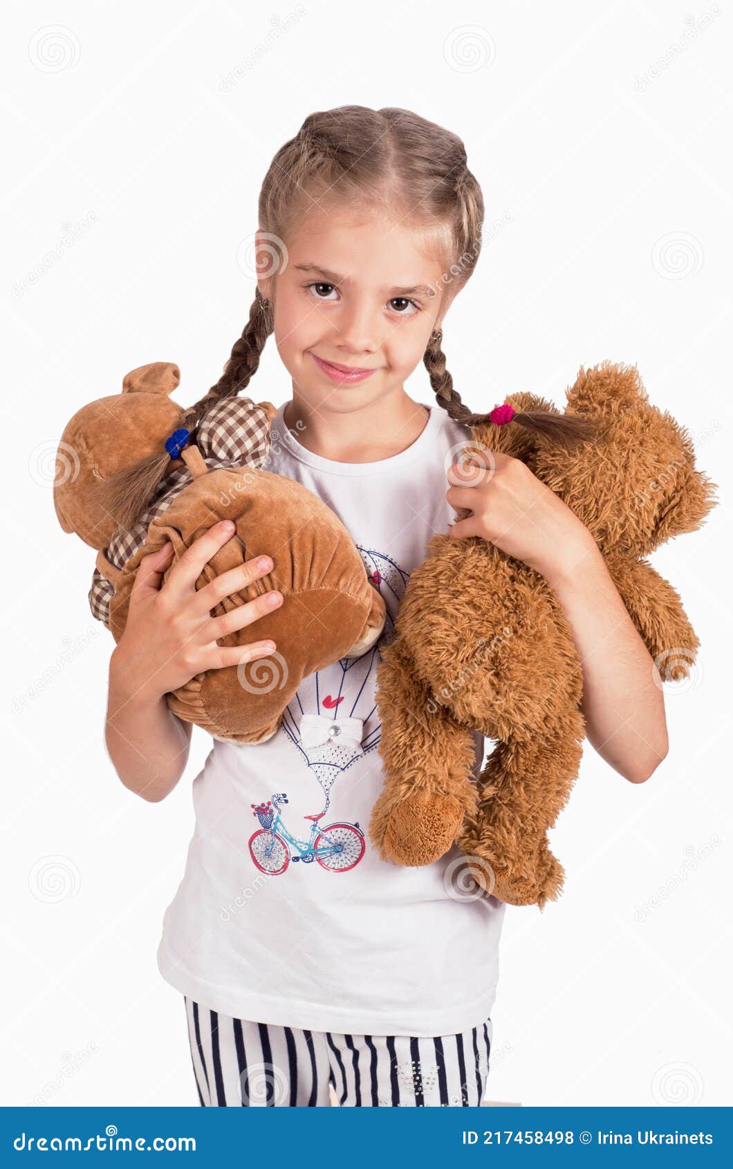 Little Girl Holding a Teddy Bear. Isolated on White Background Stock ...