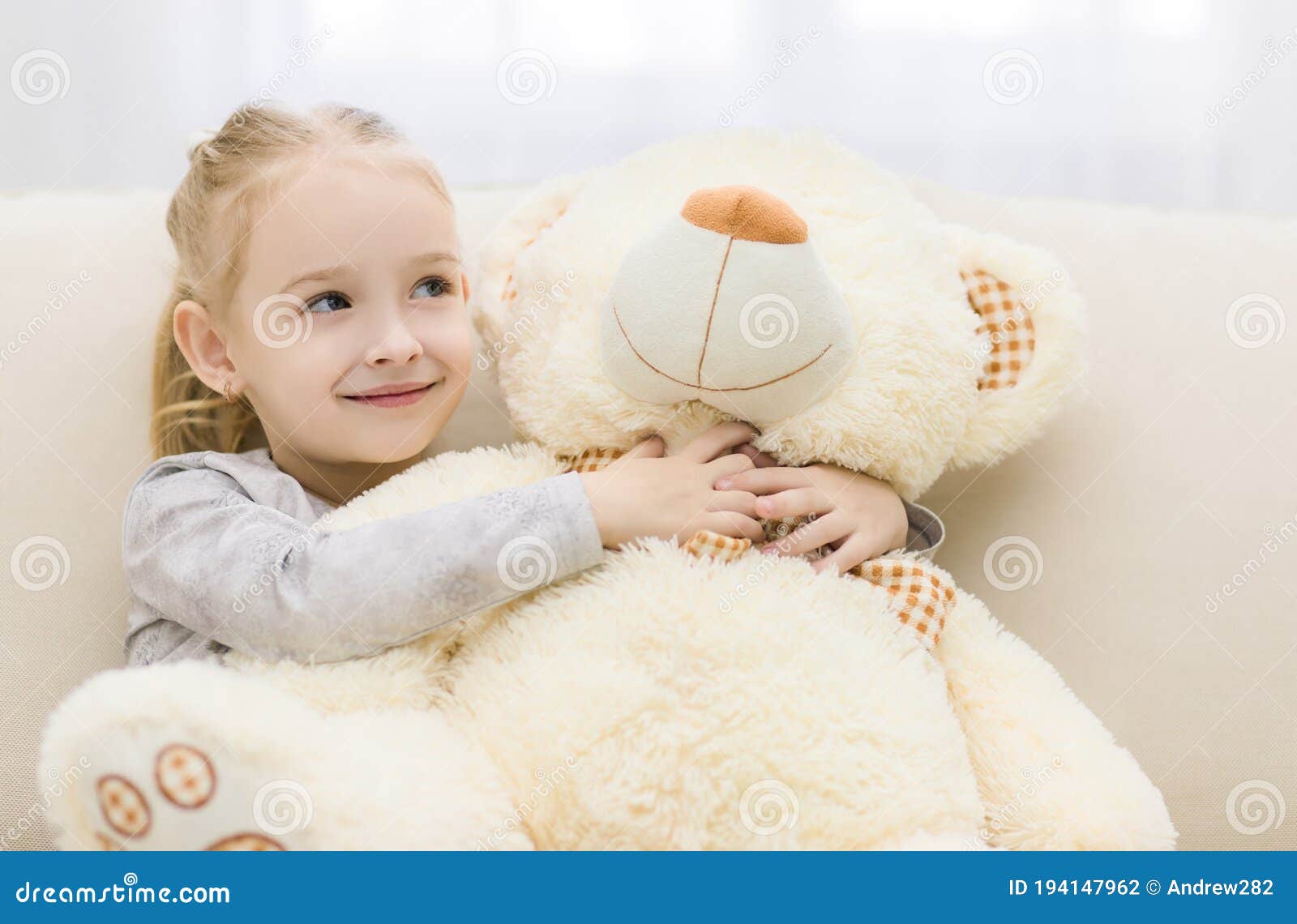 Little Girl Is Hugging Big Teddy Bear. Stock Photo - Image of child ...