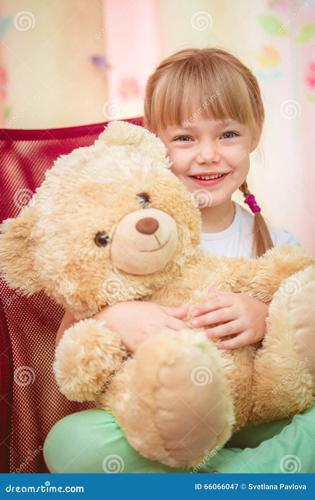 Girl Hugging Teddy Bear