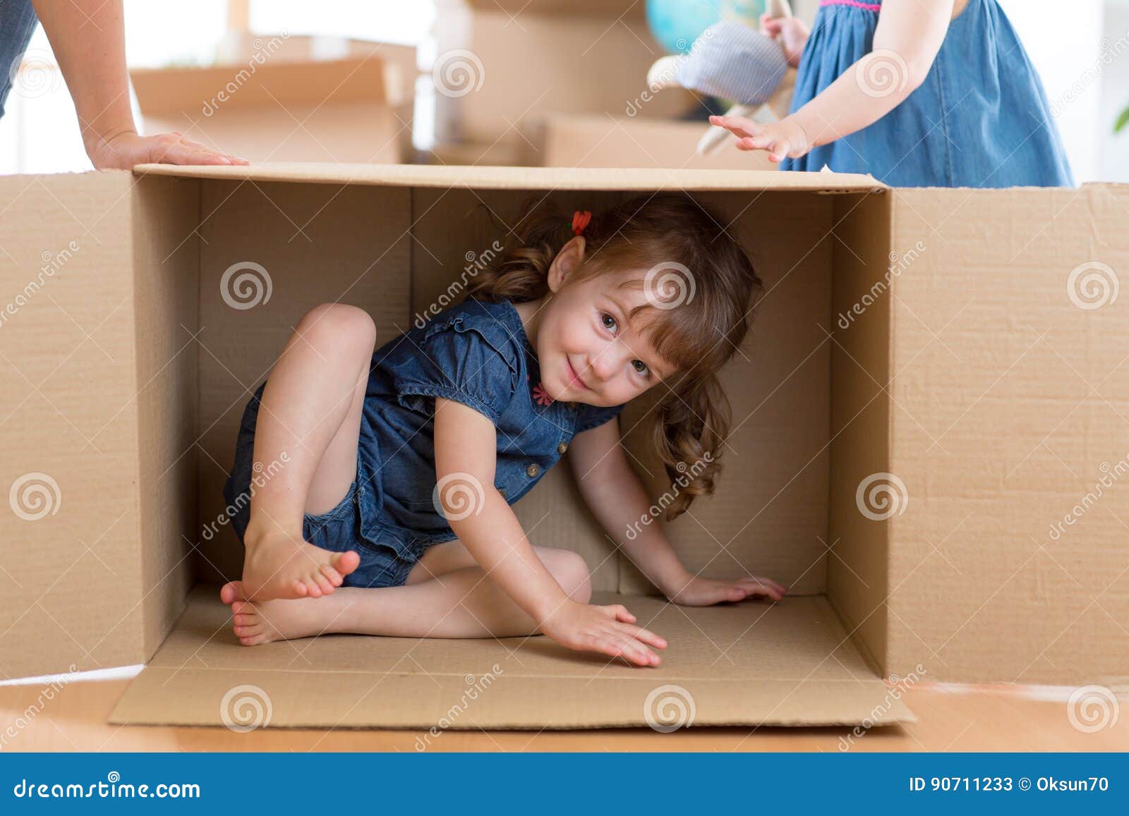 Little Girl Inside Box in New Flat after Moving Stock Image Image of