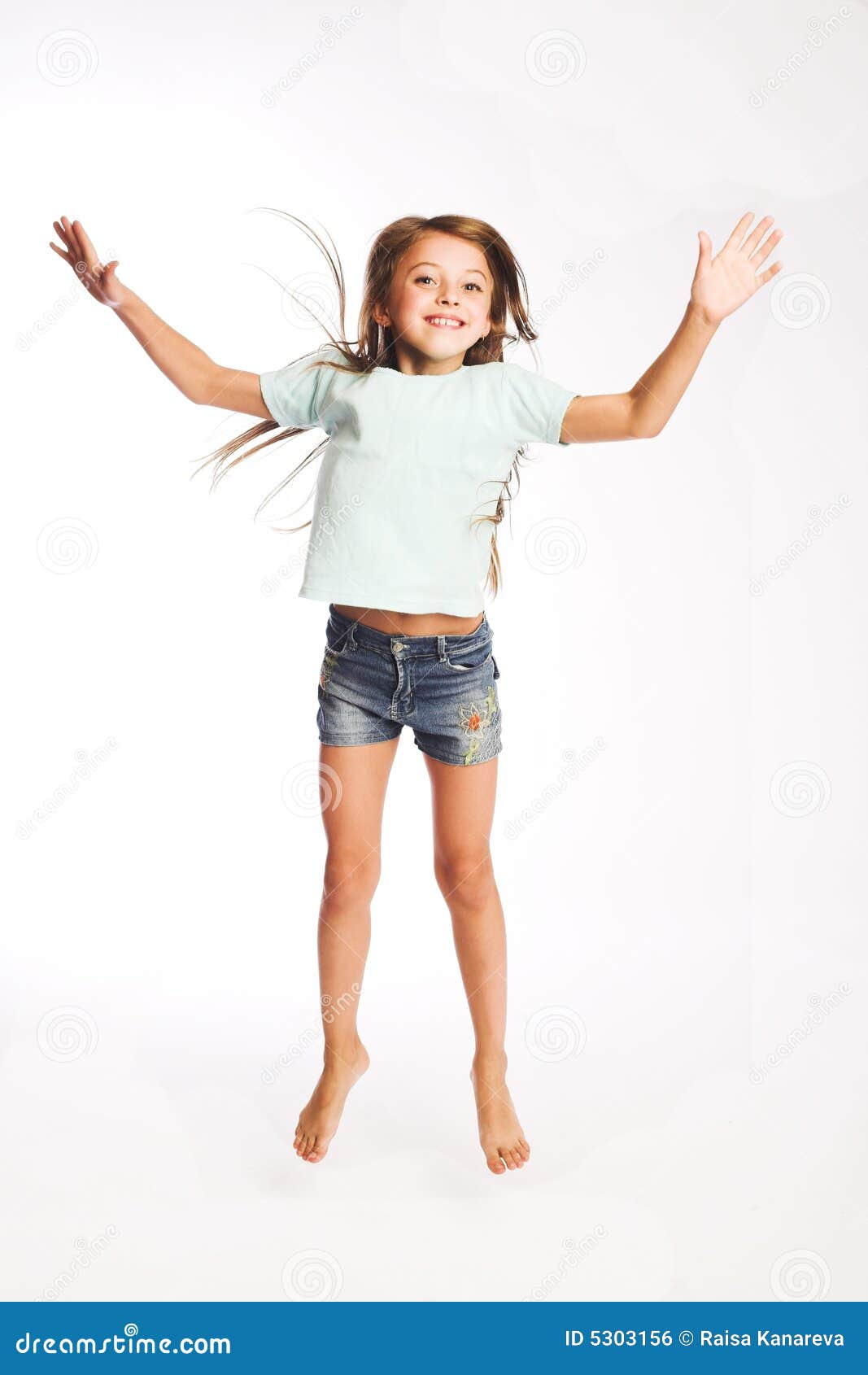 Little girl jumping of joy stock photo. Image of gravity 5303156