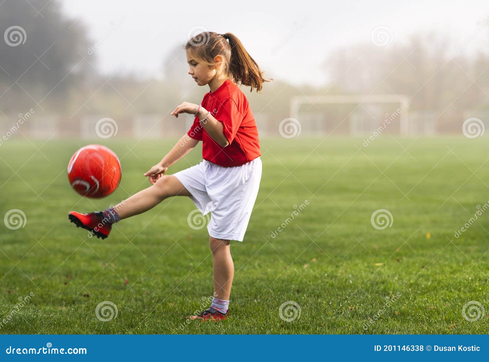 girl kicks girl in head soccer