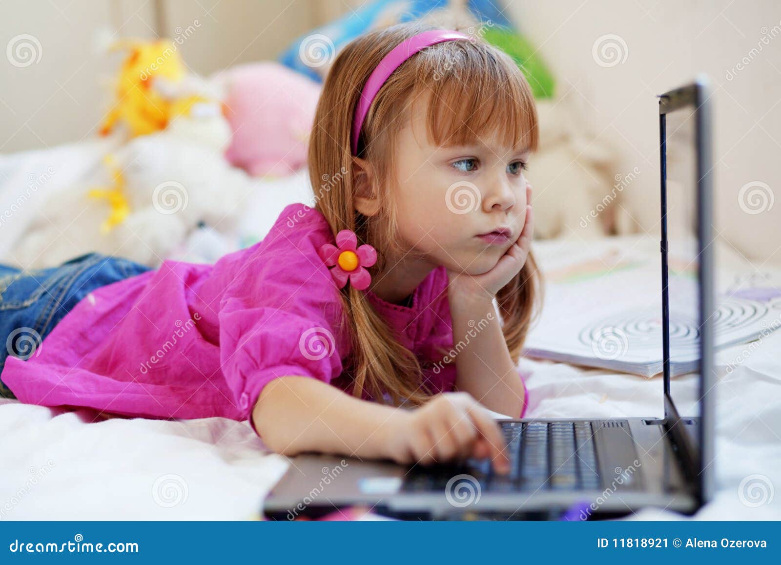 Little girl with laptop stock image. Image of generation 11818921