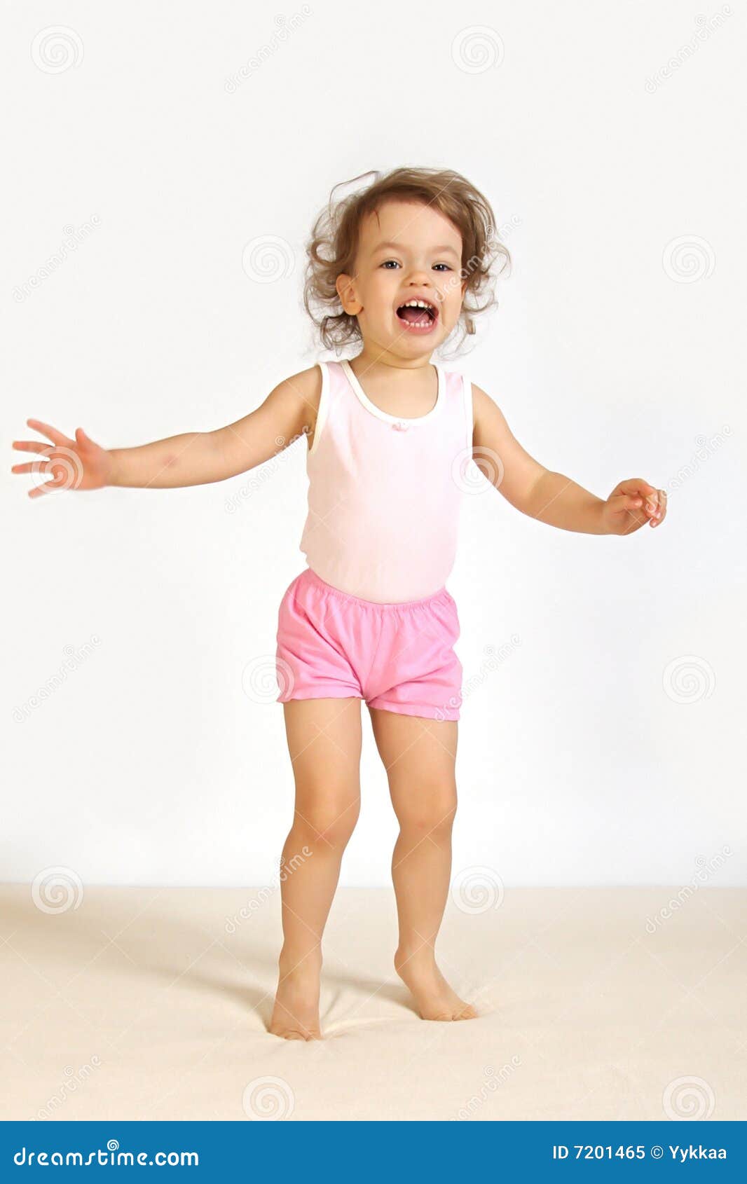 A little girl laughs. stock image. Image of girl, leotard 7201465
