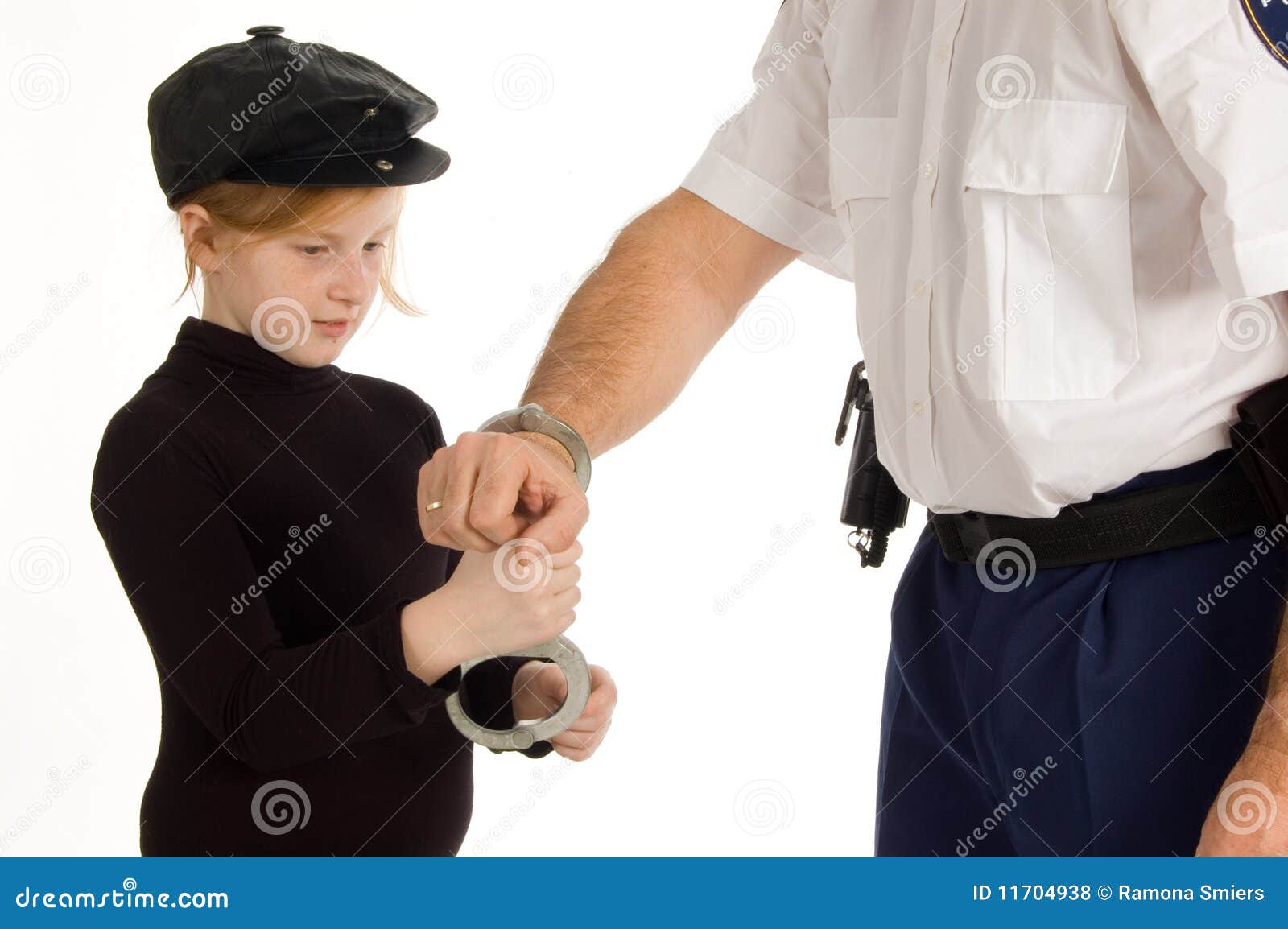 Little Girl In Handcuffs Stock Photo 21645942