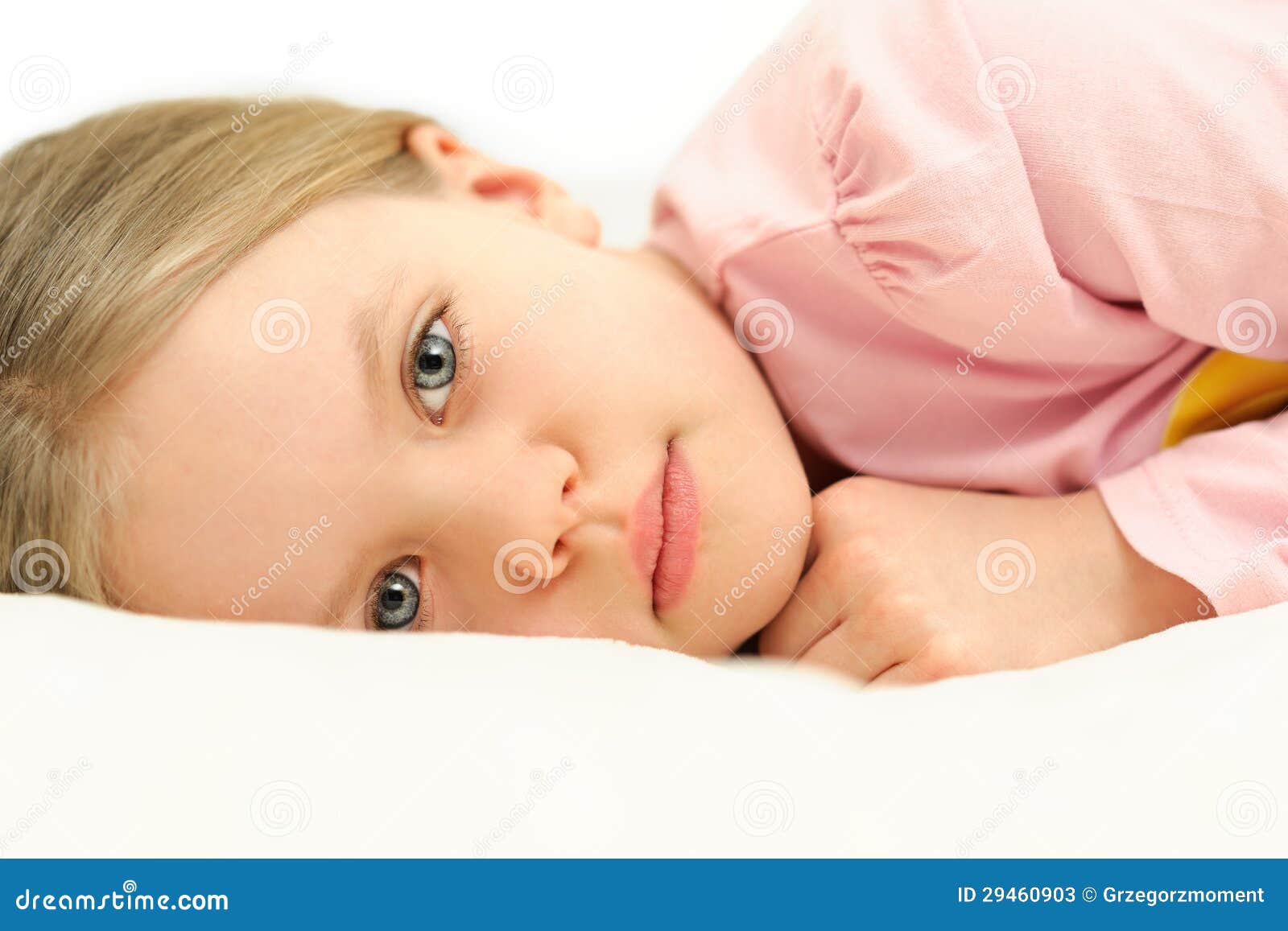 A Little Girl Lying in Bed with Open Eyes Stock Image Image of girl