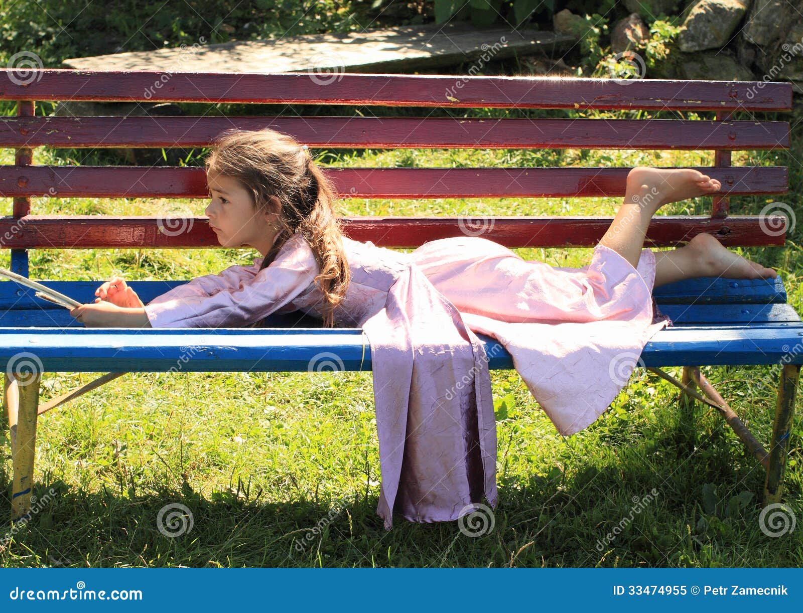 Fotolia Little Girl Lying Barefoot