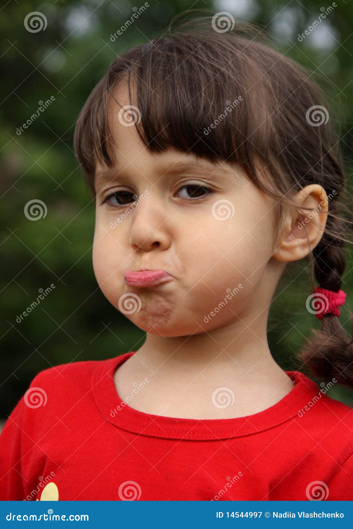 Little Girl Making Funny Face Stock Image - Image of head, looking: 14544997