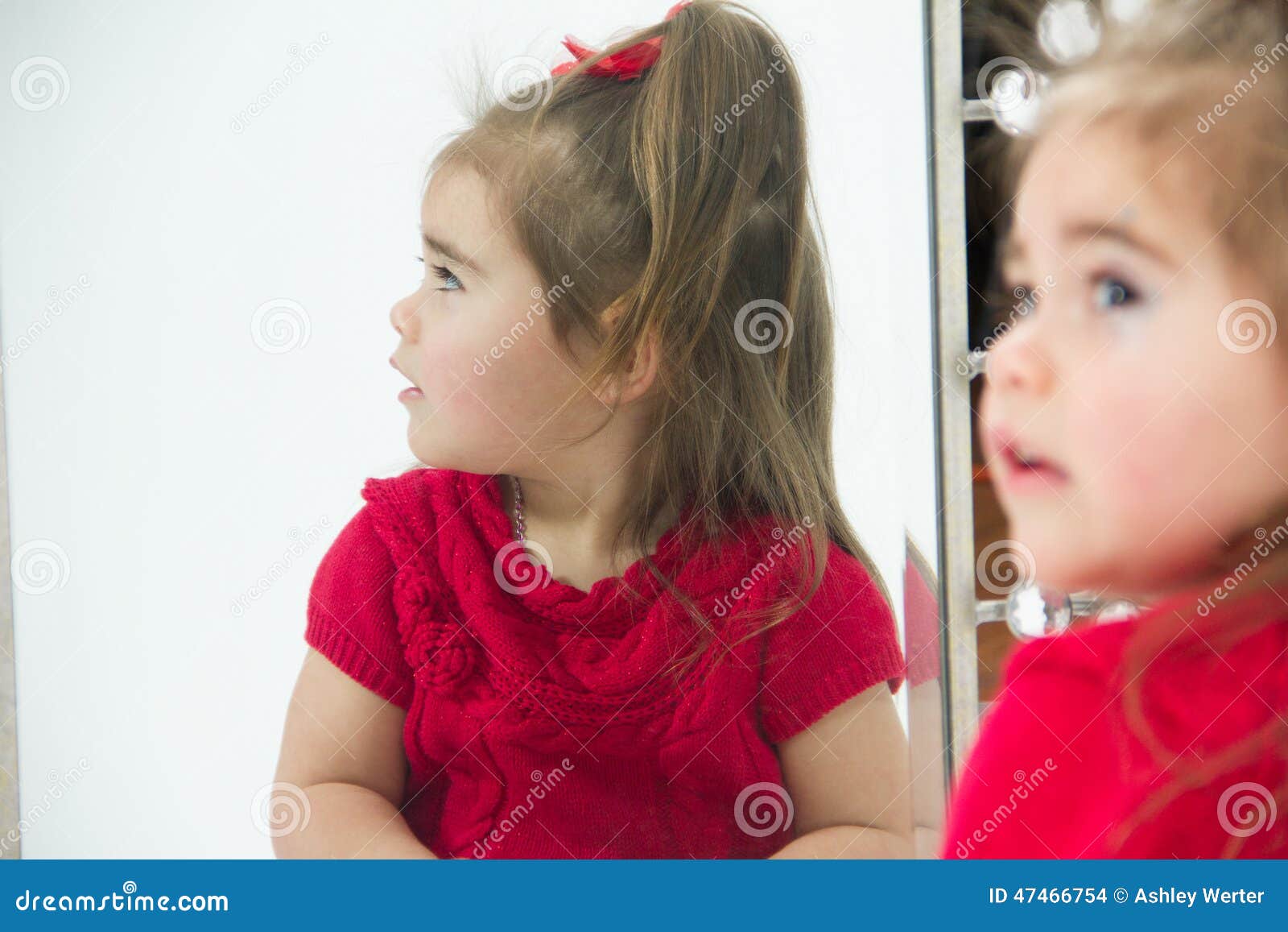 Little girl in Mirror stock photo. Image of toddler, mirror 47466754