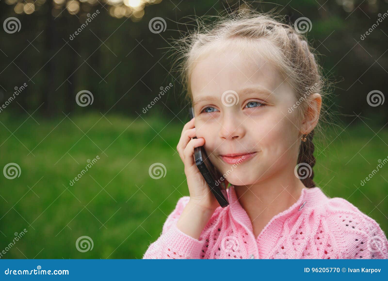 Little Girl with Mobile Phone Stock Photo Image of grass, beautiful