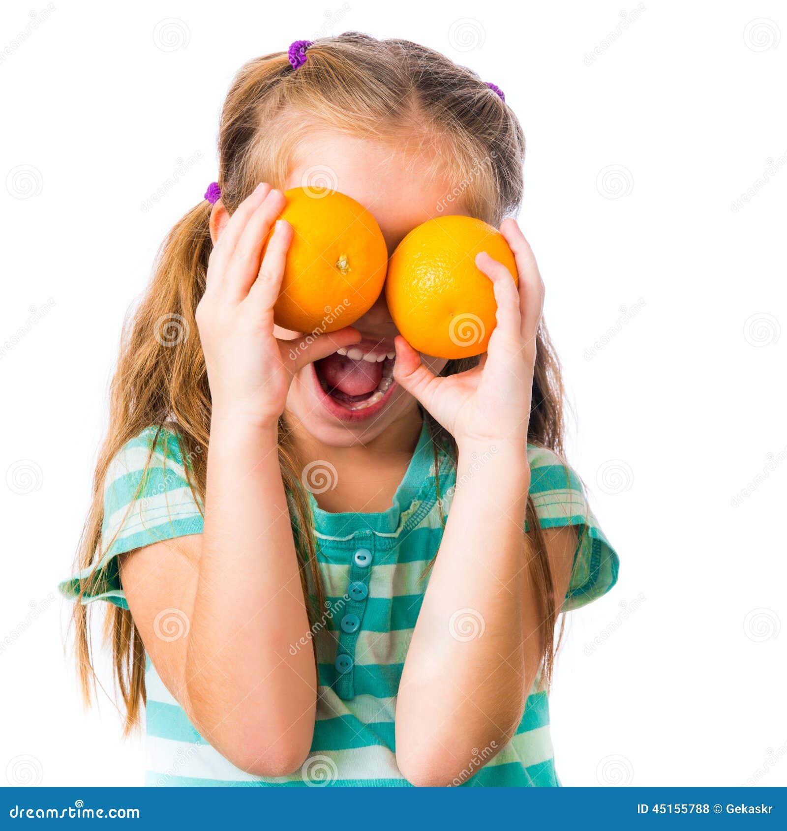 Little girl with oranges stock photo. Image of exotic 45155788