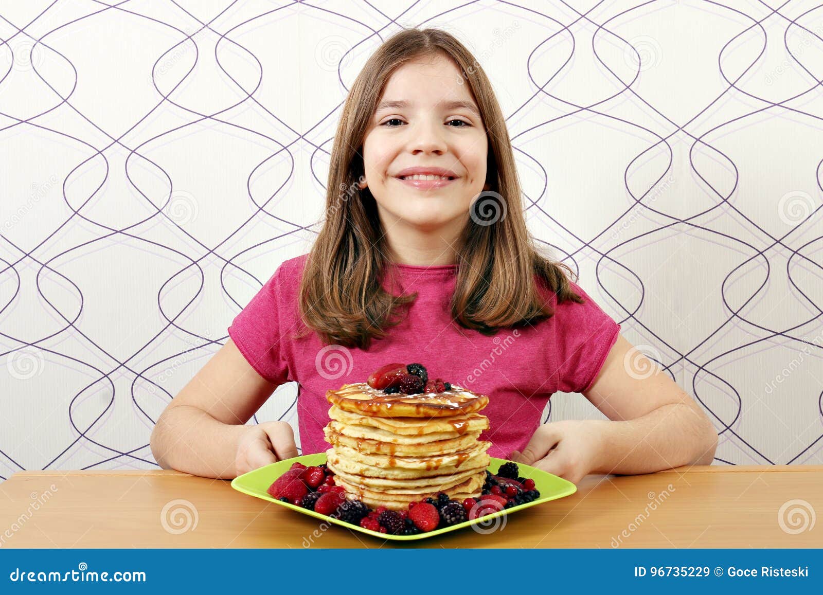 Little girl with pancakes stock image. Image of cake 96735229