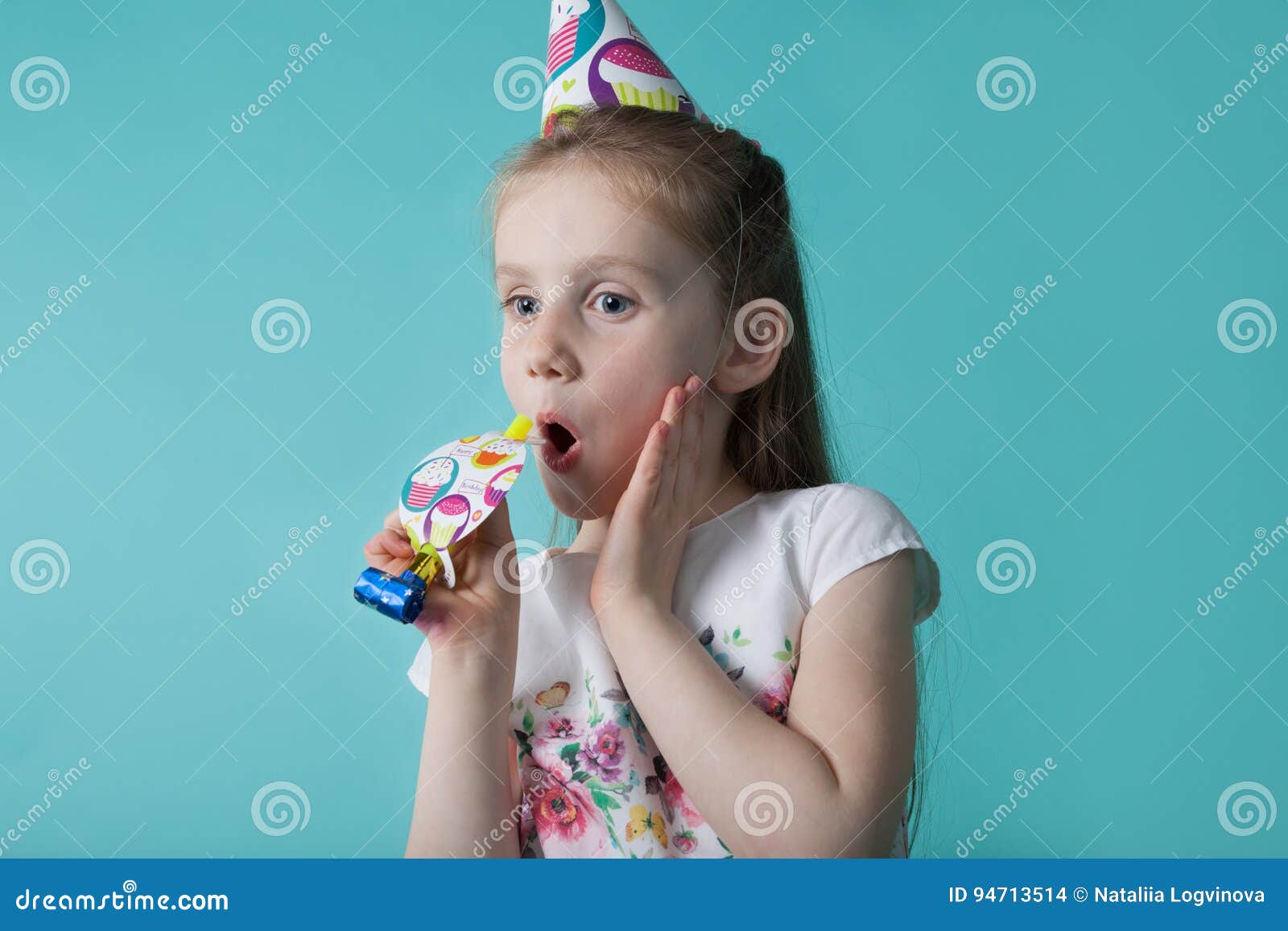 Little Girl with Party Hat on Mint Background. Birthday Girl Blo Stock ...