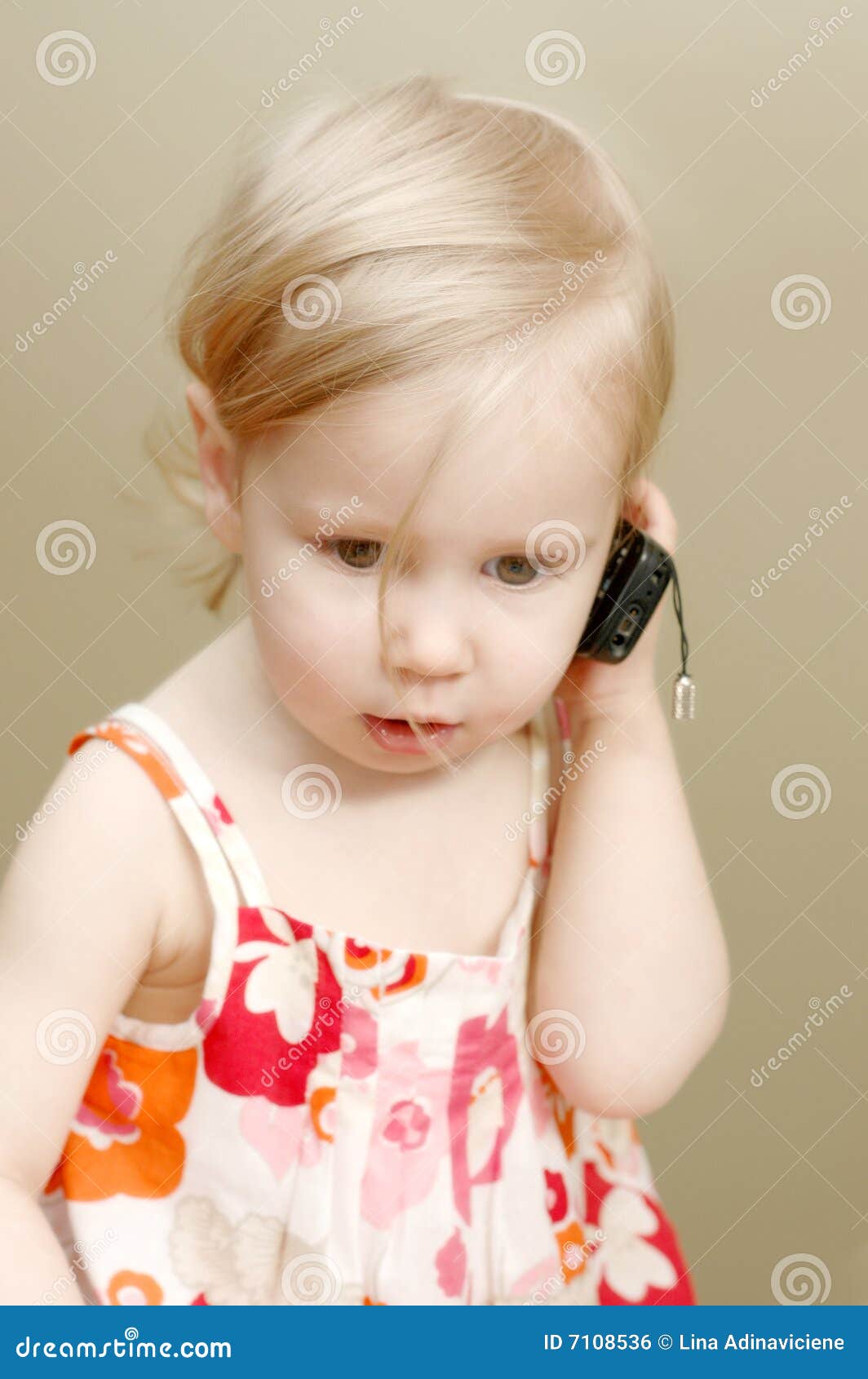 Little girl on the phone stock photo. Image of posing 7108536