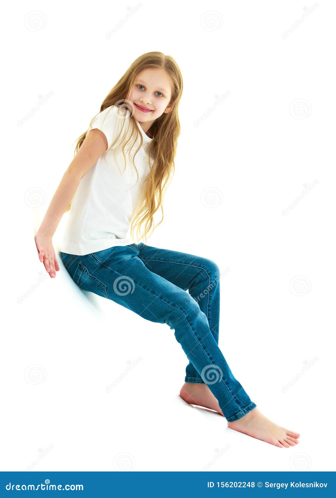 A Little Girl is Photographed in the Studio on a Cyclorame. Stock Photo ...