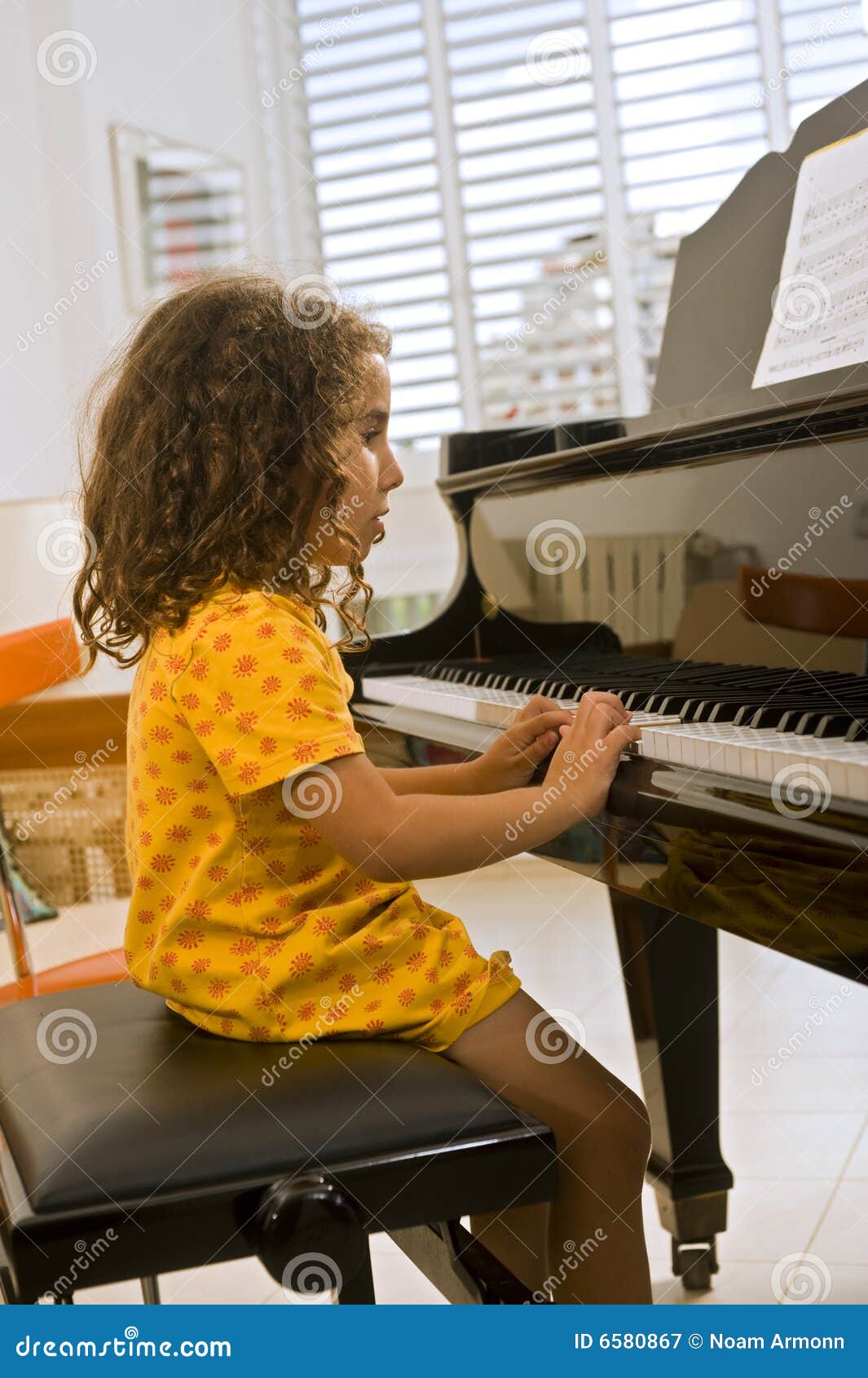 Little Girl Playing The Piano Stock Image - Image: 6580867