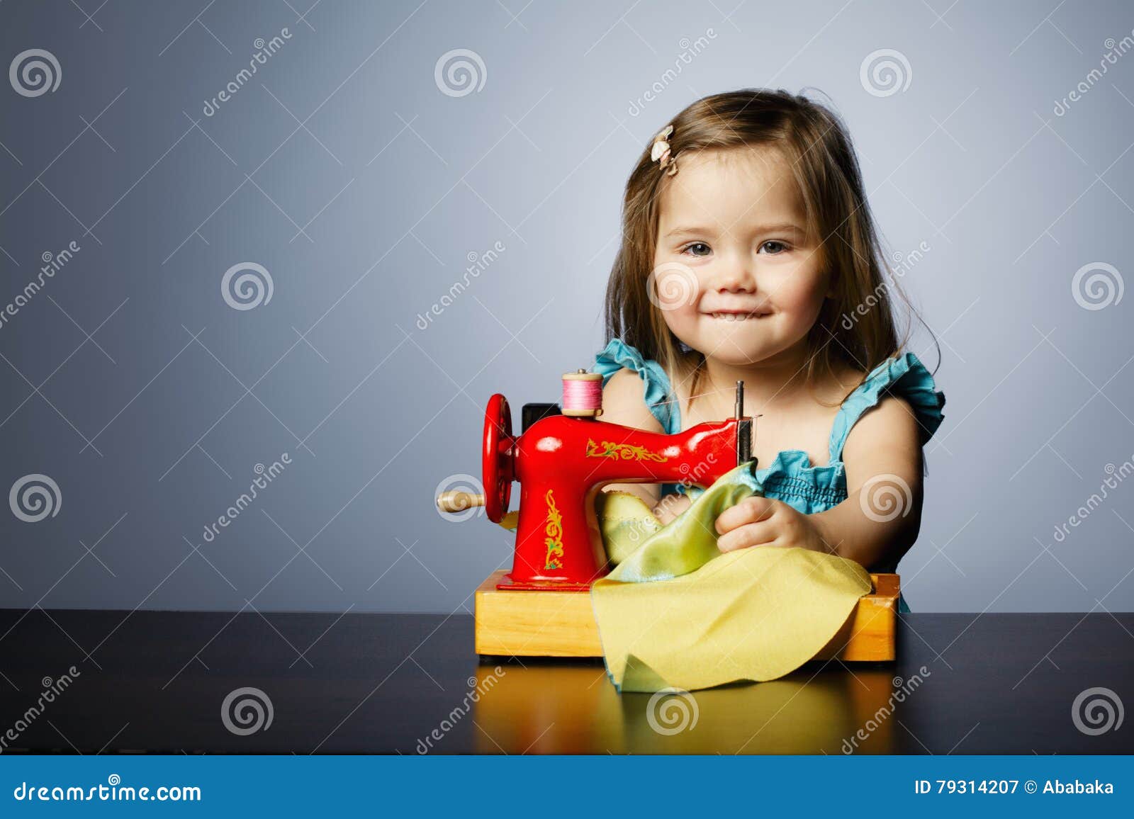 Little Girl is Playing with Sewing Machine Stock Image Image of
