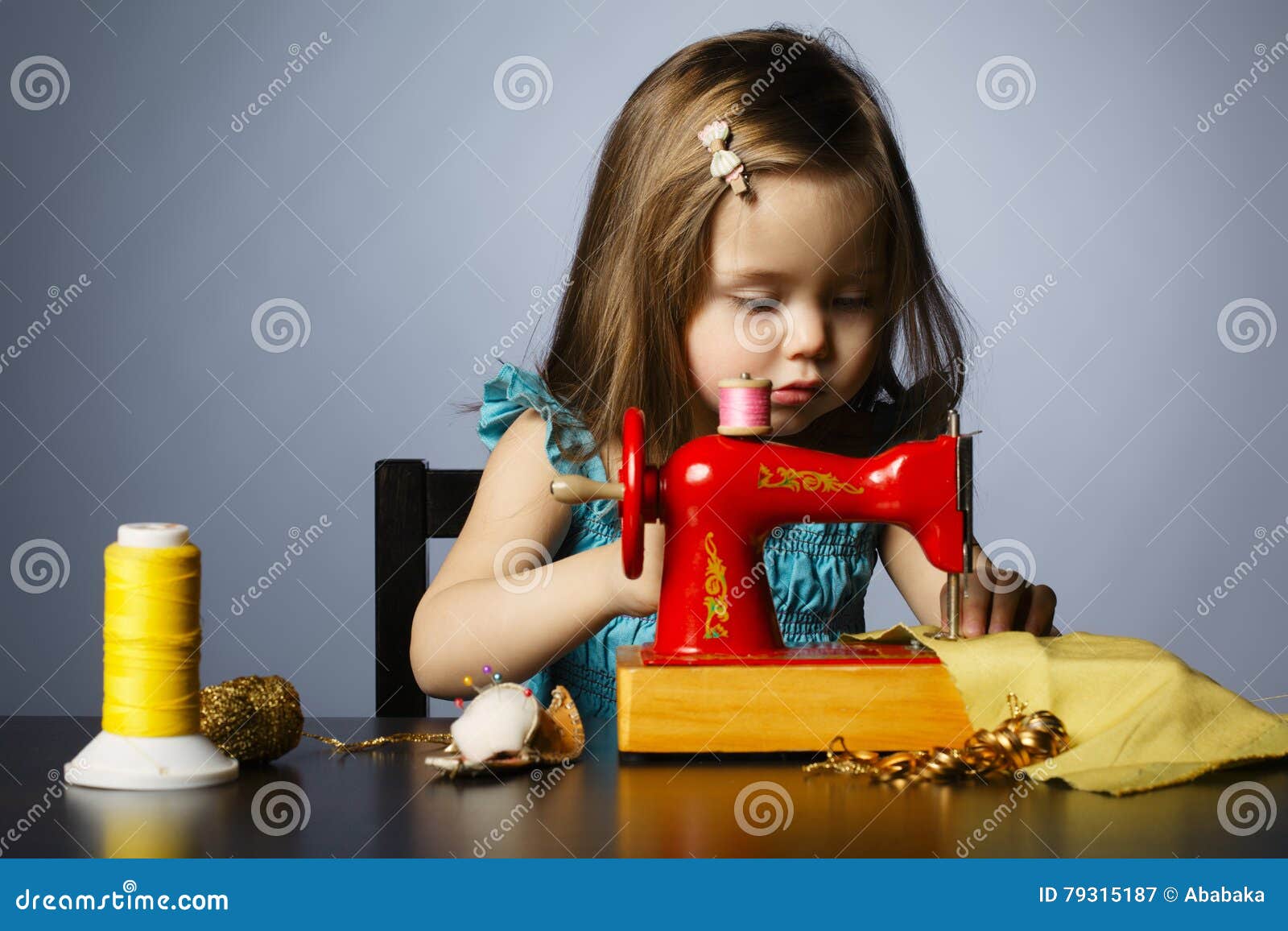 Little Girl is Playing with Sewing Machine Stock Image Image of
