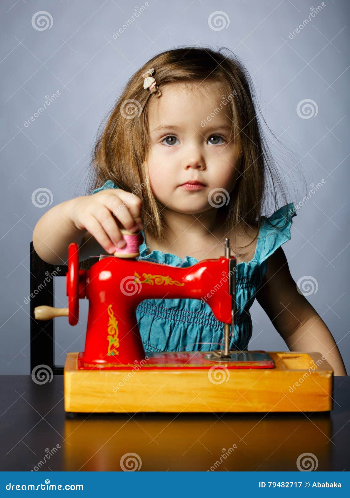 Little Girl is Playing with Sewing Machine Stock Image Image of