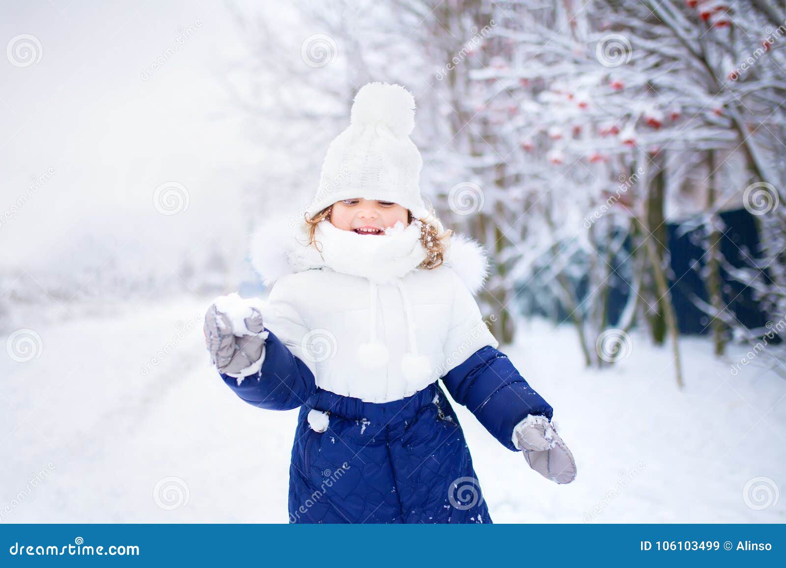 Little Girl Playing Snowballs, Winter Activity. Stock Image - Image of ...