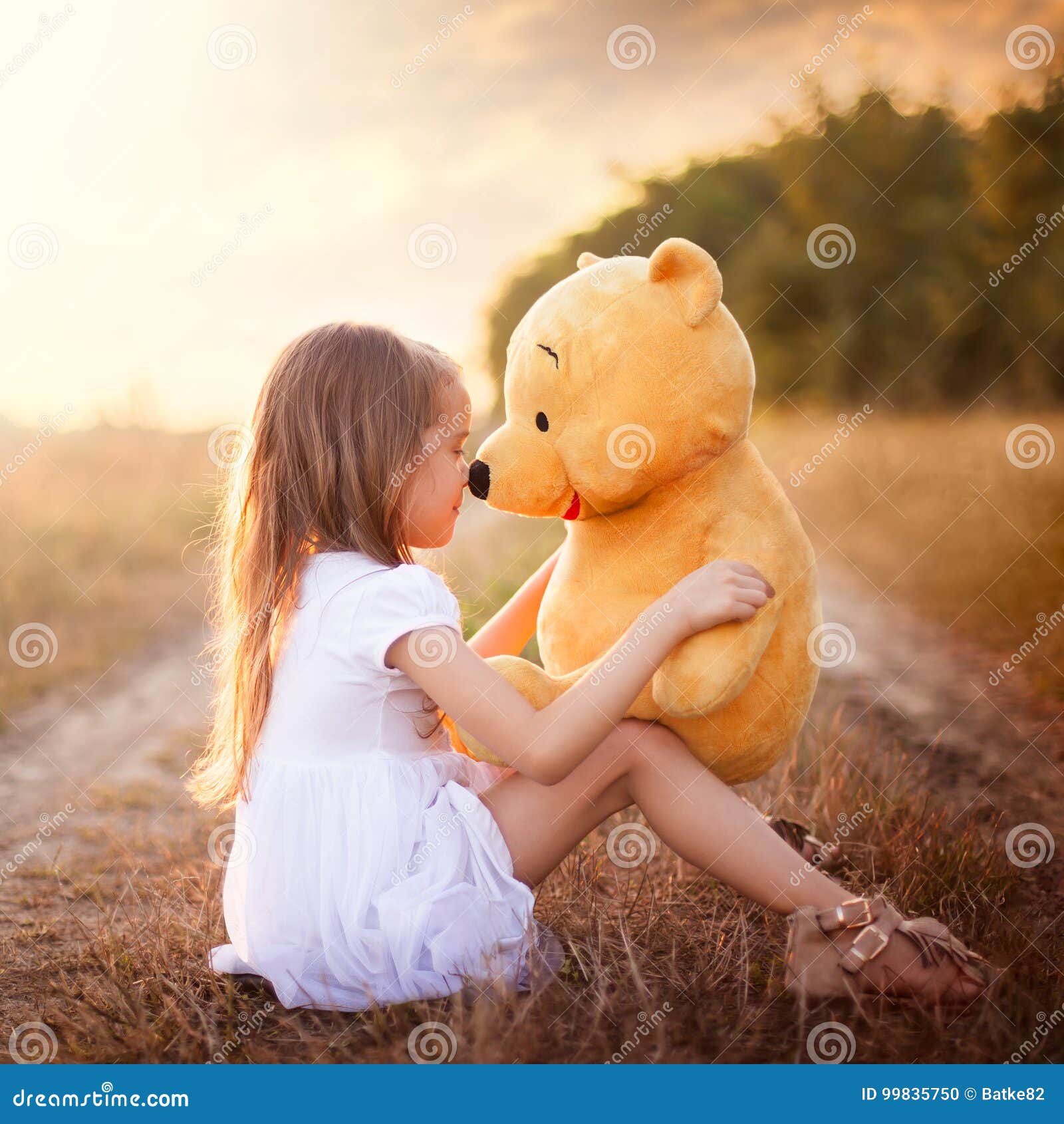 a girl with teddy bear