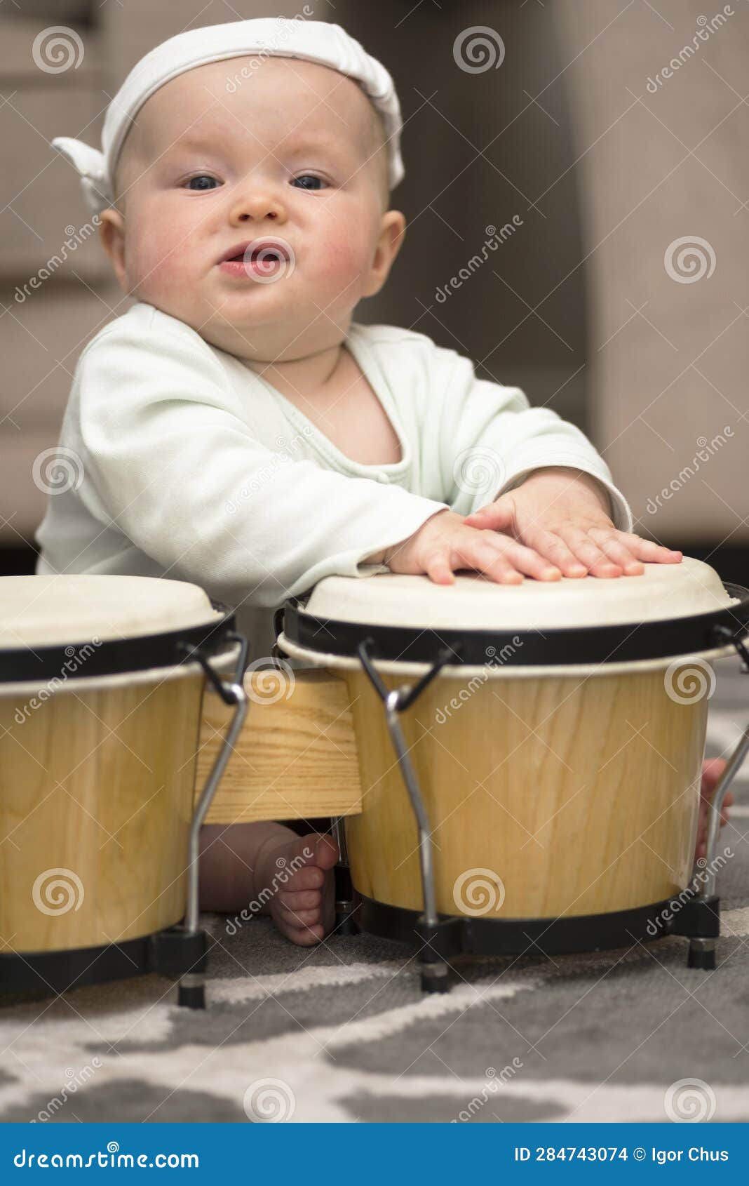 A Little Girl Plays the Drum 2023 Stock Photo Image of cute