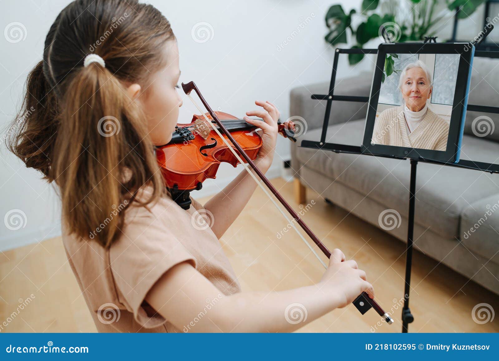 Little Girl Plays Violin, Showing Her Progress To Her Grandma in Video Stock Image - Image of child, potted: 218102595