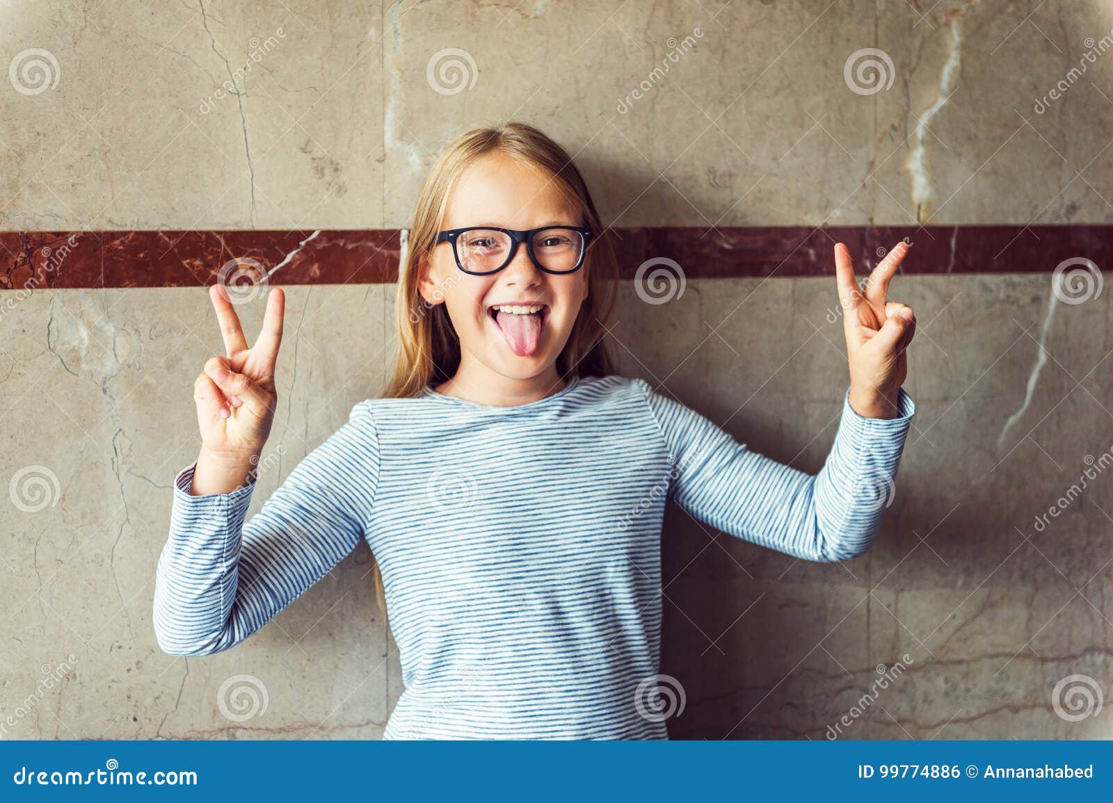 Little Girl Pulling Up Her Shirt